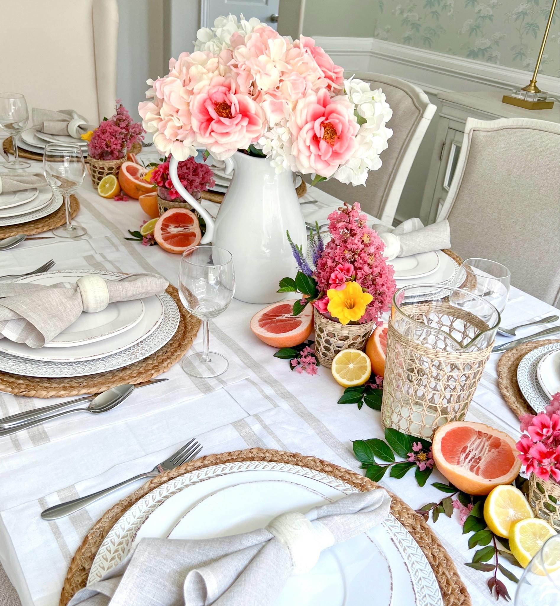 Decorating with citrus is one of my favorite ways to make a table feel fresh, colorful, and effortlessly beautiful. From grapefruit accents to bright lemons paired with soft florals and woven textures, this tablescape feels like the perfect blend of elegant and inviting. Who else loves using fruit as part of their decor? ! 🍋🍊🌸

#SummerDecorating #SummerTablescape #CitrusDecor #TableStyling #EntertainingAtHome #FloralDecor #HomeDecorInspo #TablescapeInspo #SummerEntertaining #DiningRoomDecor

#LTKHome #LTKWedding #LTKSeasonal