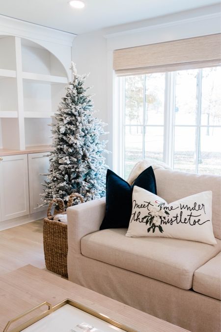 The cutest mistletoe pillow for your Christmas living room! 

Holiday decor, Christmas decor, flocked tree, slipcovered sofa 



#LTKHoliday #LTKhome #LTKHolidaySale