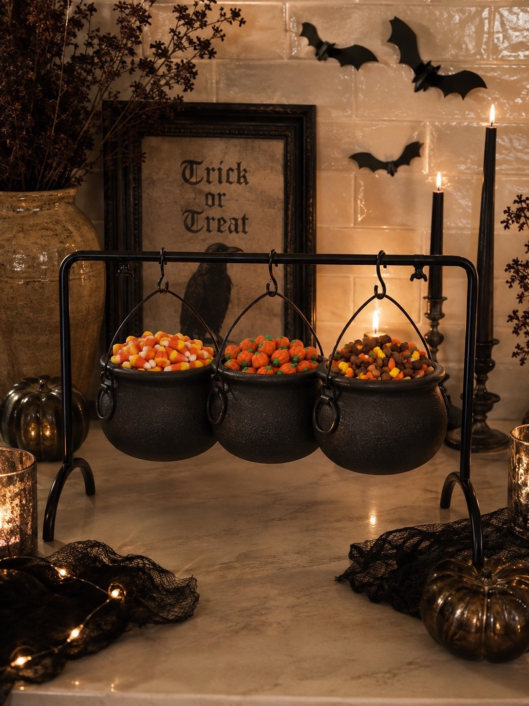The Halloween Candy Bar Everyone Will Want 🎃

Halloween treats are even more fun when they double as decor! These hanging cauldrons filled with candy corn, mini pumpkins, and festive fall treats create the cutest Halloween candy station while still feeling elevated and cozy.

Perfect for a kitchen counter, coffee bar, entryway, or Halloween party setup. Fill each cauldron with a different favorite and let everyone help themselves!

Follow @farmtotablecreations on Instagram for more home finds and styling inspiration.

#HalloweenDecor #HalloweenFinds #HalloweenCandy #HalloweenKitchen #HalloweenParty #SpookySeason #FallDecor #AmazonHalloween #HalloweenHome #HalloweenInspo

#LTKHome #LTKSaleAlert #LTKSeasonal