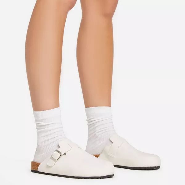 Stare Buckle Detail Slip On Flat Mule In White Faux Suede | Ego Shoes (UK)