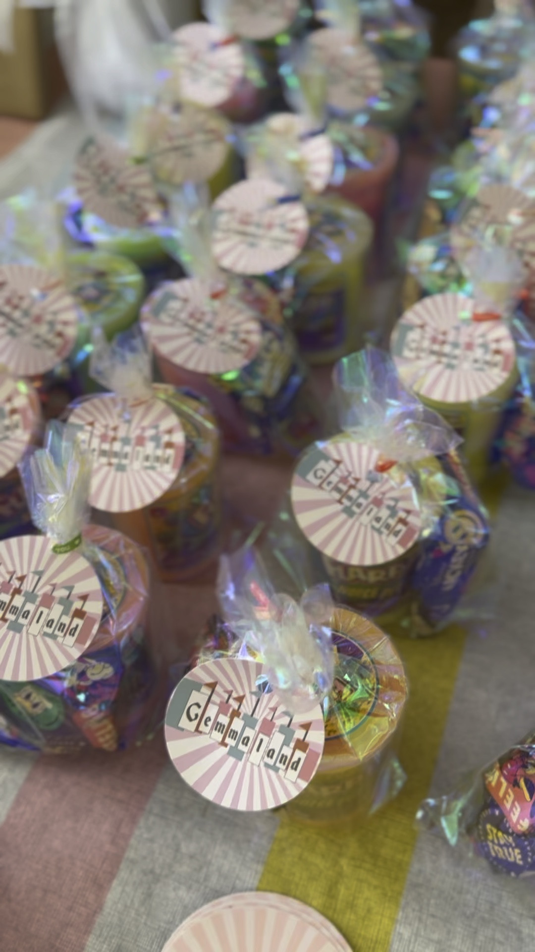 For goodie bags, I handed out Gemma’s current favorite toy, flarp noise putty. I added some Mickey Mouse fruit snacks to tie it into the Disneyland theme. We also handed out popcorn in these custom popcorn cups that said “Gemmaland”

#LTKkids