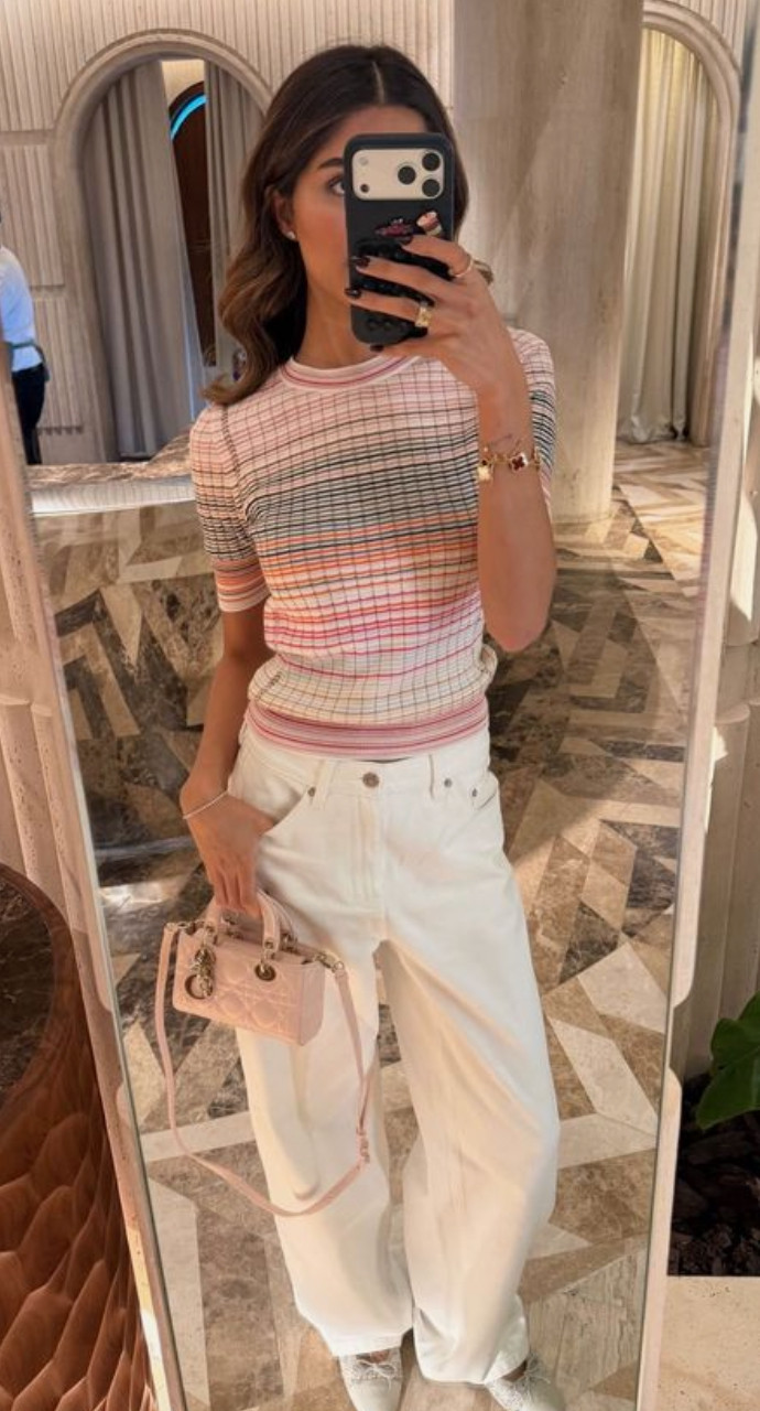 Chic everyday outfit featuring a striped knit top, white trousers, and a mini handbag—perfect for elevated casual style and effortless outfit ideas.
Style tip: balance fitted and relaxed pieces for a flattering shape, stick to a soft neutral color palette for versatility, and add structured accessories to create a timeless, polished outfit you can wear on repeat. 

 #LTKootd