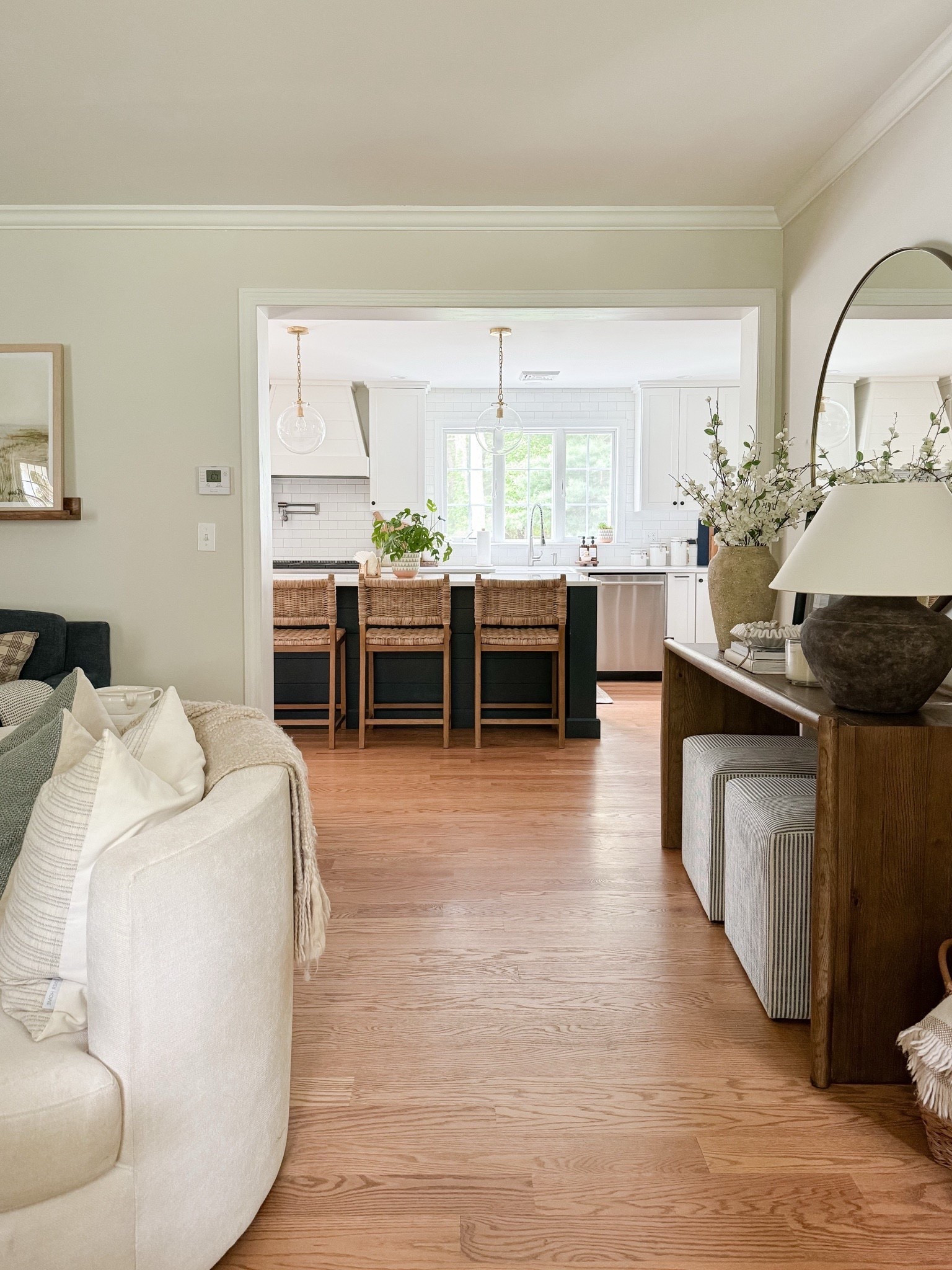 A view I don’t share as often, but that I love! 🤍 From our woven counter stools to our styled console table, I hope this leaves you with some inspo for your own home. Linking all the decor seen here! 

#LTKHome #LTKSaleAlert #LTKSeasonal