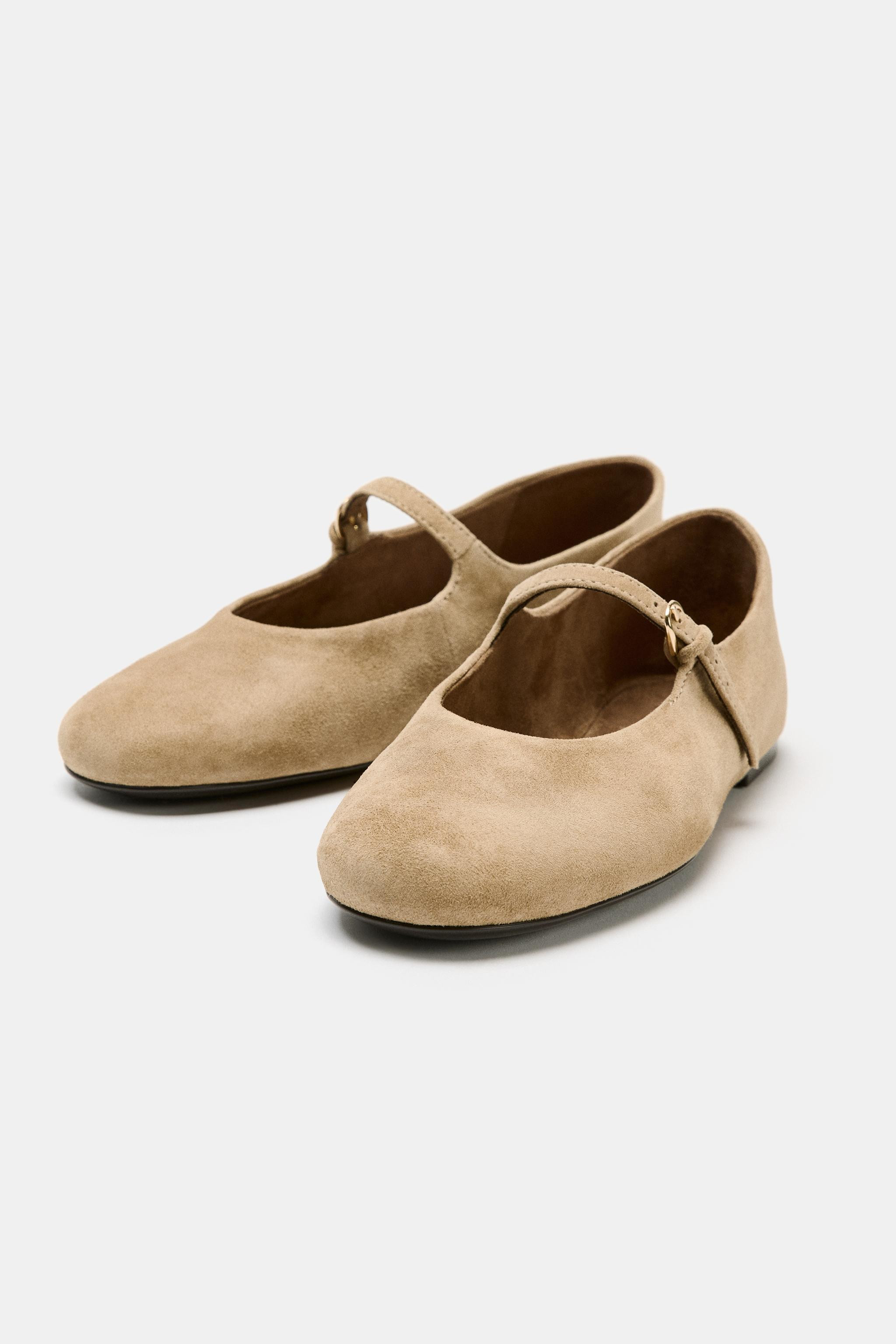 Suede ballet flats. Front strap with buckle. Round toe.Sole height: 1 cm. | Zara UK