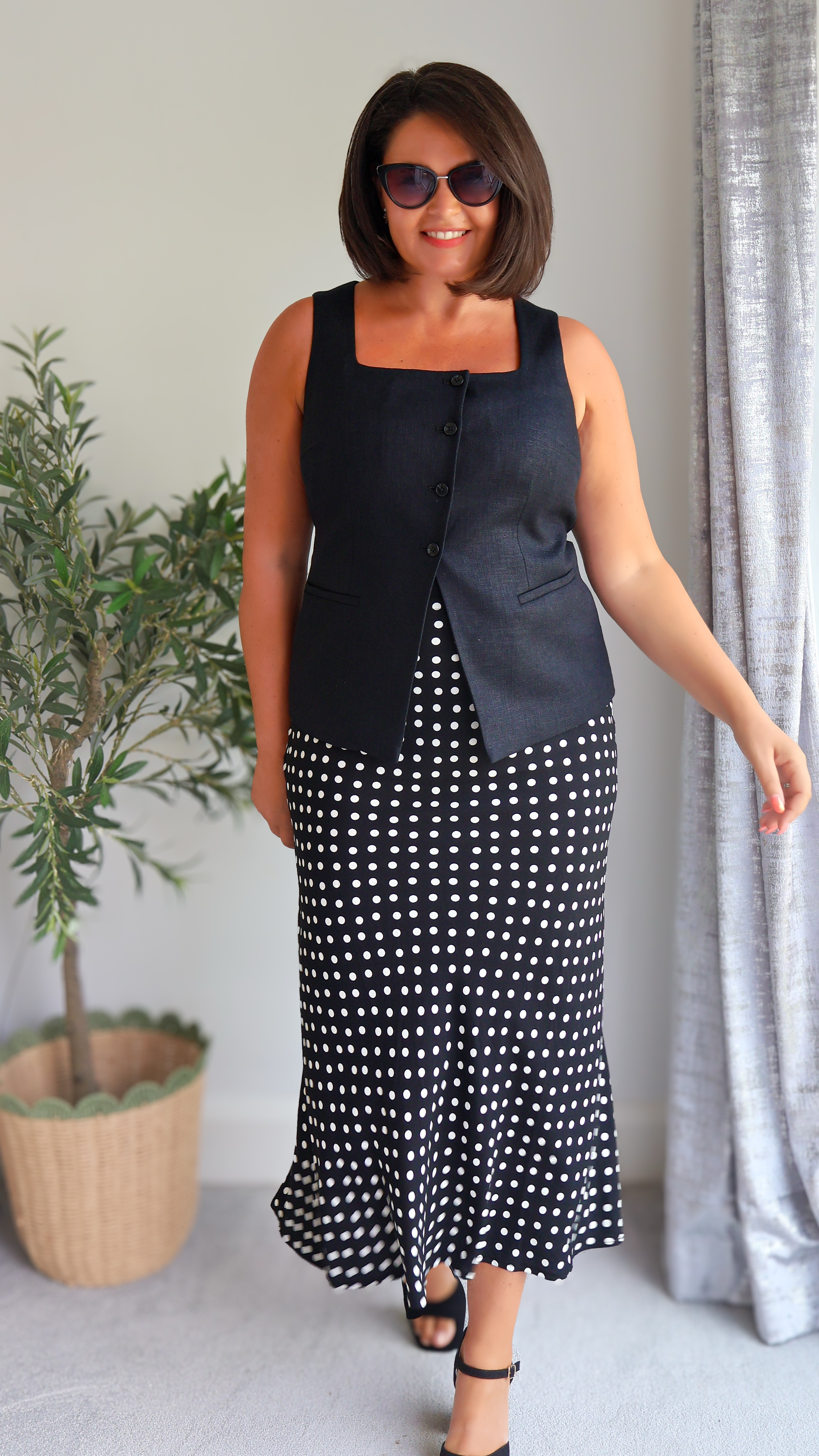 Looking for outfit ideas that flatter curves and feel good to wear? I styled this dreamy polka dot midi skirt 5 different ways to show how versatile one piece can be — whether you’re heading out for coffee, date night, or just want to feel fabulous running errands.

I’m a size 14/16 and these looks are all about real style, real shape, and real comfort. From trainers to heels, blazers to cardis — this skirt does it all.

The petal cardigans in black s d yellow and the longline waistcoat are all M&S but obvs can’t link at the moment with their IT issues after the hacking! 

#LTKmidsize #LTKuk #LTKsummer