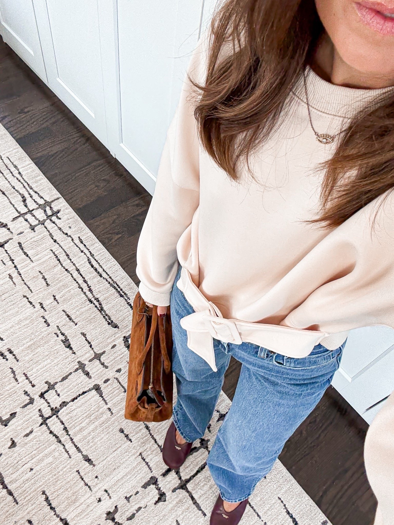 This bow detail makes the coziest sweatshirt look chic 🎀 

#LTKOver40 #LTKSeasonal #LTKootd