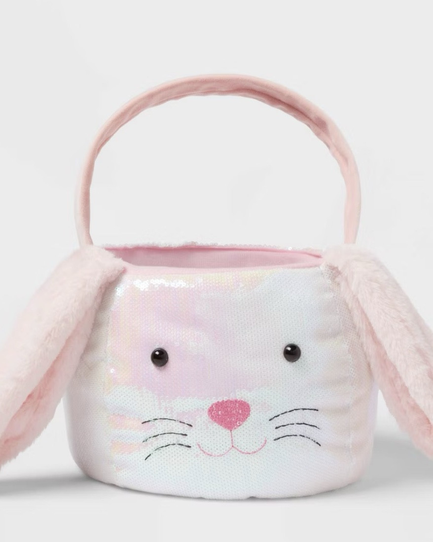 Easter themed round decorative basket
Features unique and stylish rope design
Made from a blend of durable material
Designed with handle and ideal for universal placement
Dimensions : 12 Inches (H) x 11 Inches (W) x 11 Inches (D)
Spot or wipe clean for easy care
Description
Get ready for Easter with the Round Sequins Easter Basket Iridescent from Spritz™. This charming basket features a unique and stylish rope design that adds a touch of iridescent to your celebrations. Made from a blend of durable materials, it's built to last through many Easters to come. The basket is designed with a convenient handle, making it easy to carry around. Its universal placement makes it perfect for holding Easter eggs, treats, or even as a decorative piece in your home. Enjoy the festive season with this delightful basket.

Spritz™: Pops of joy that make the moment™.@Target 

#LTKSaleAlert #LTKU #LTKFestival