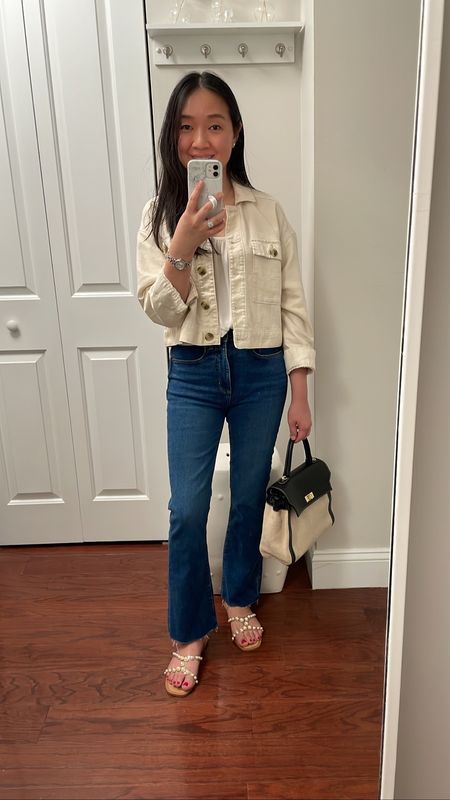 Oversized cropped linen blend jacket (XS petite is an oversized fit) and kick crop jeans (0 regular).

Zara pearl slides (I took size 7 1/2 which is 38 in european size) -
https://c8.is/42t7WhQ

Canvas and leather Lancaster Paris bag (Poshmark find)