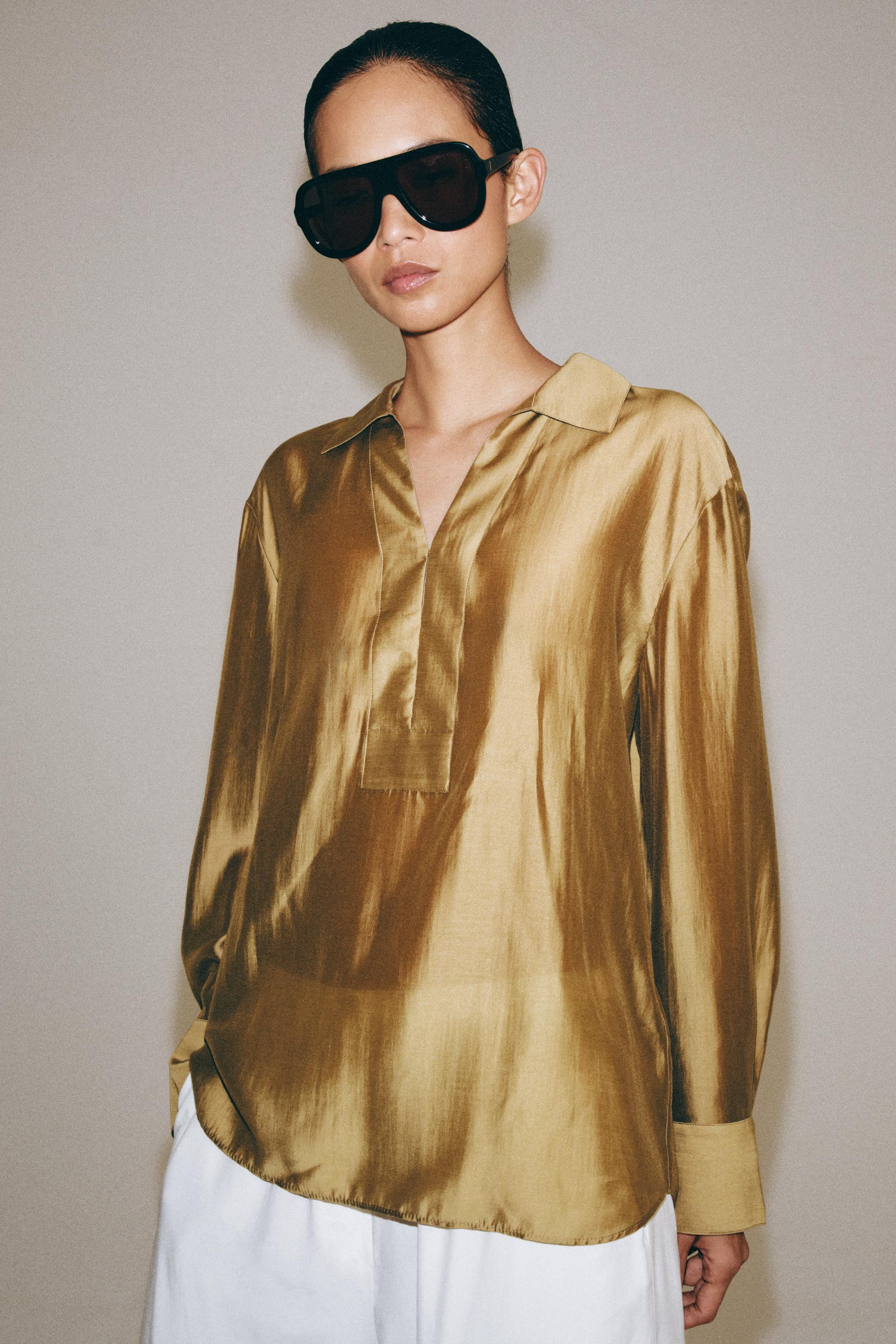 ZARA WOMAN COLLECTION. Shirt made from a lyocell blend fabric. Lapel collar and long sleeves with... | Zara US