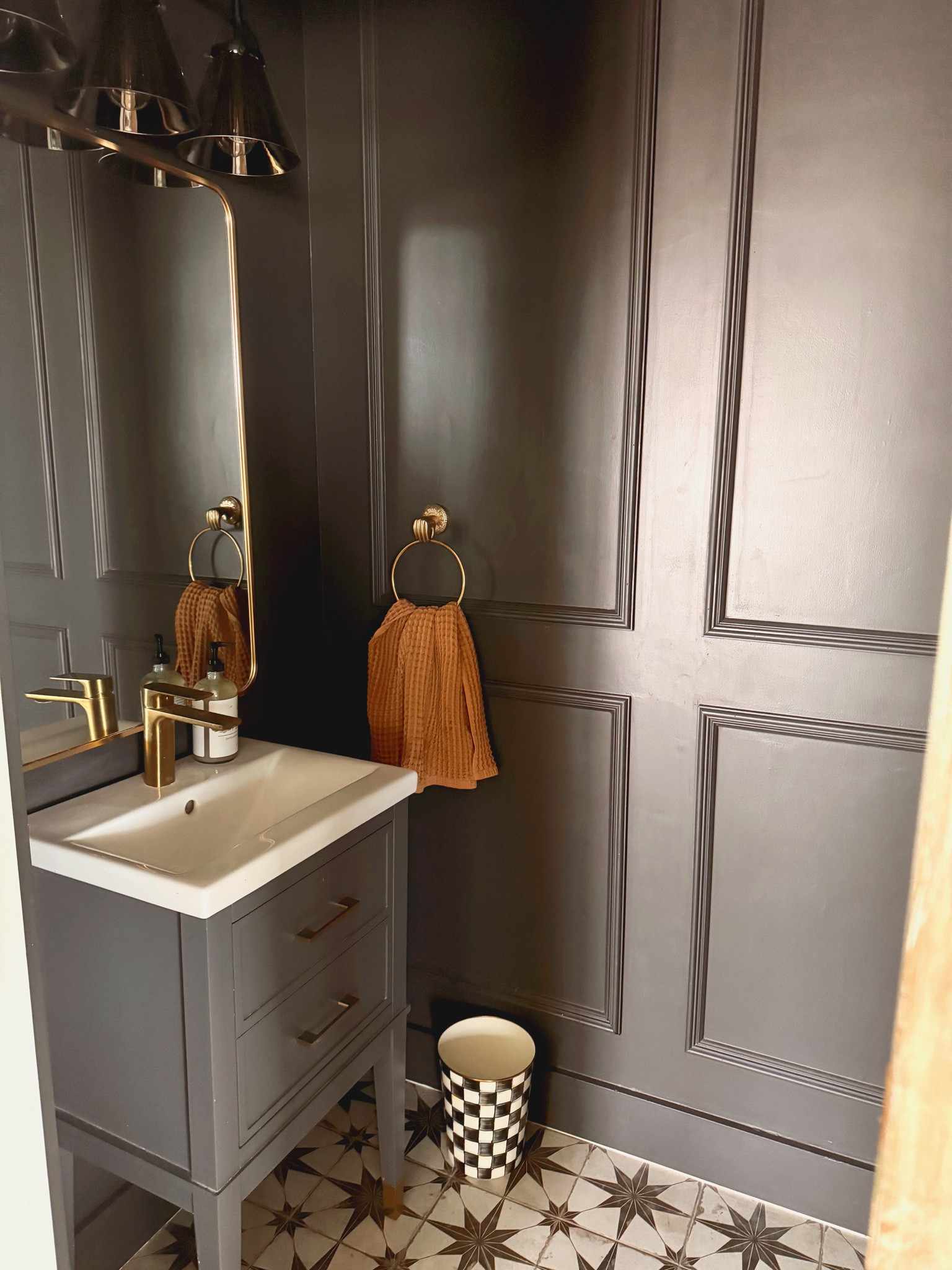 Powder bath small bathroom decor. Wall color is Sherwin Williams Iron Ore

#LTKsalealert #LTKhome #LTKGiftGuide