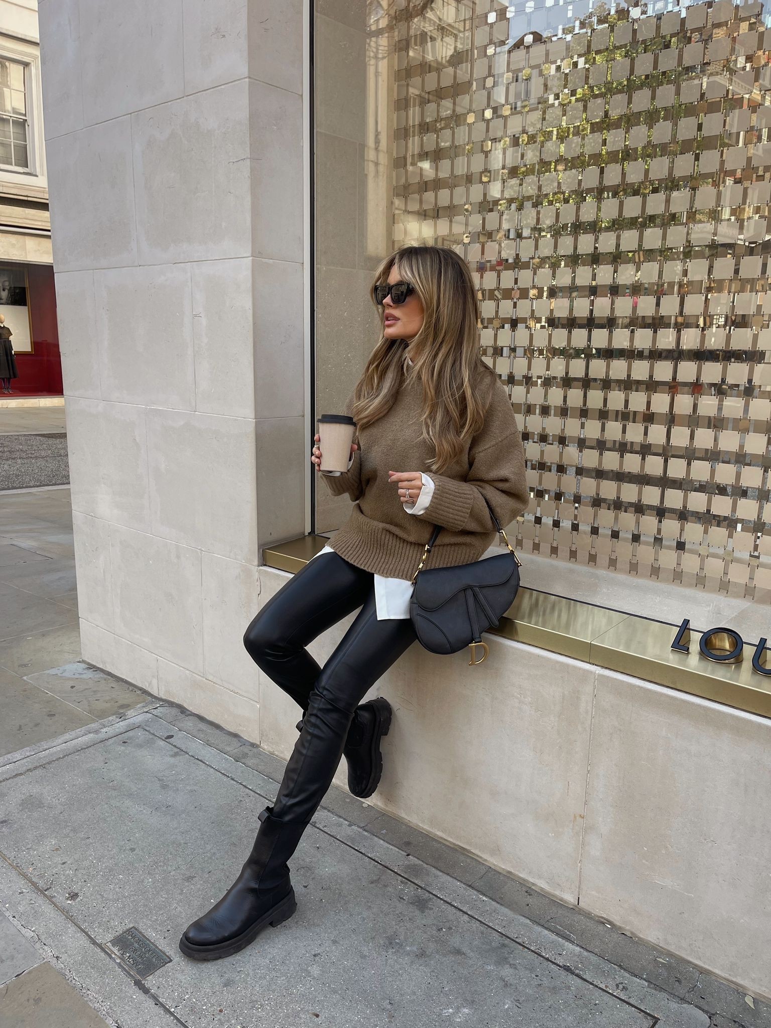 Easy autumn outfit - oversized beige cosy jumper from my collection with pretty lavish, white oversized shirt, Celine style sunglasses from Katie Loxton, leather leggings & black chunky boots, styled with a saddle bag. Great dupe linked below!

#LTKeurope #LTKstyletip #LTKSeasonal
