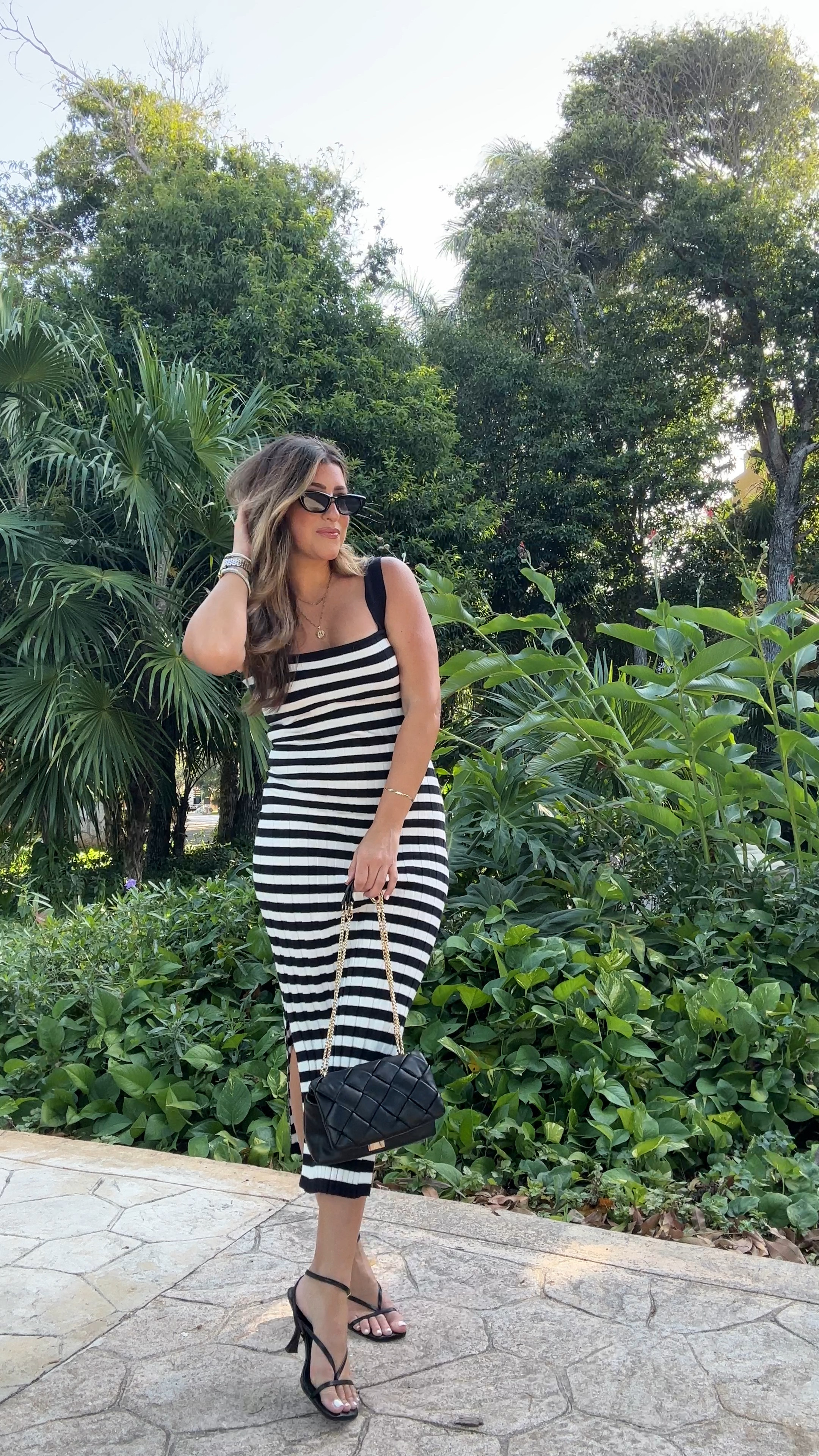 Love love love this black midi striped dress! Great stretch to it and comfy. Wearing a med. Use my code LAURENHORN for 20% OFF! Xx

#LTKstyletip #LTKSeasonal #LTKtravel