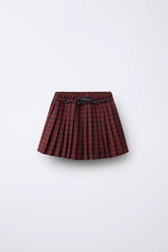 Skort with elastic waistband and front bow appliqué. Front pleat detail and plaid print. | Zara Canada