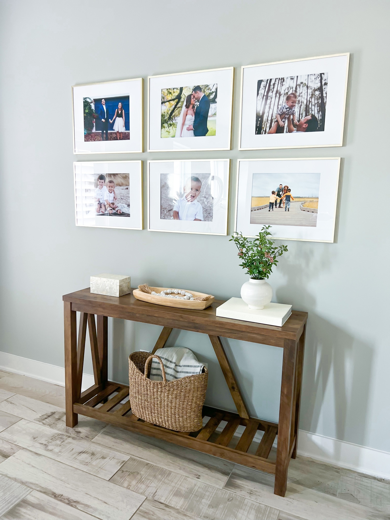 Home decor. Target gold picture frames (11x14). Console table. Neutral home decor. Spring home decor. Coastal home decor. 

#LTKFind #LTKfamily #LTKhome