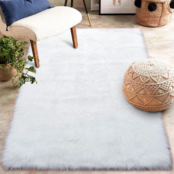 Haja Fluffy Faux Sheepskin Fur Shag Area Rug in White | Wayfair North America