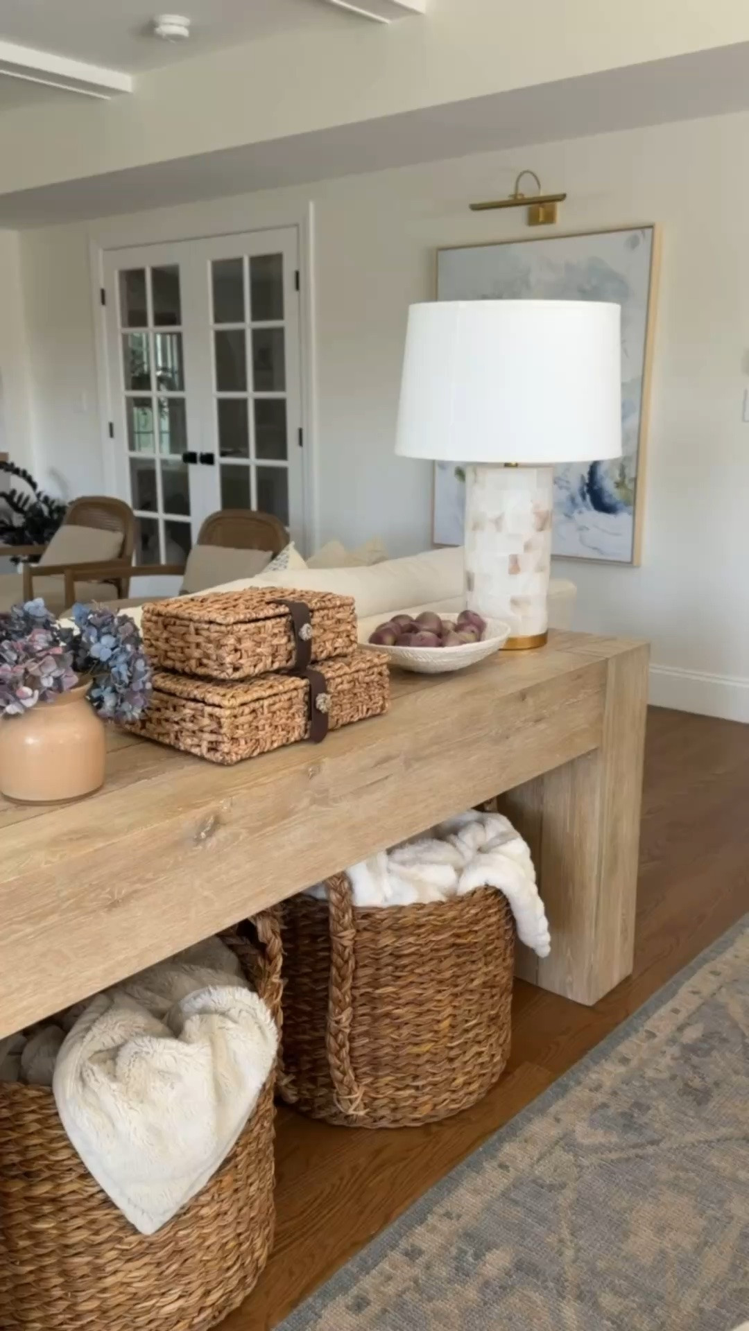 Family room console table styling inspiration ✨ These small woven baskets are perfect for remotes or cords!

#LTKHome