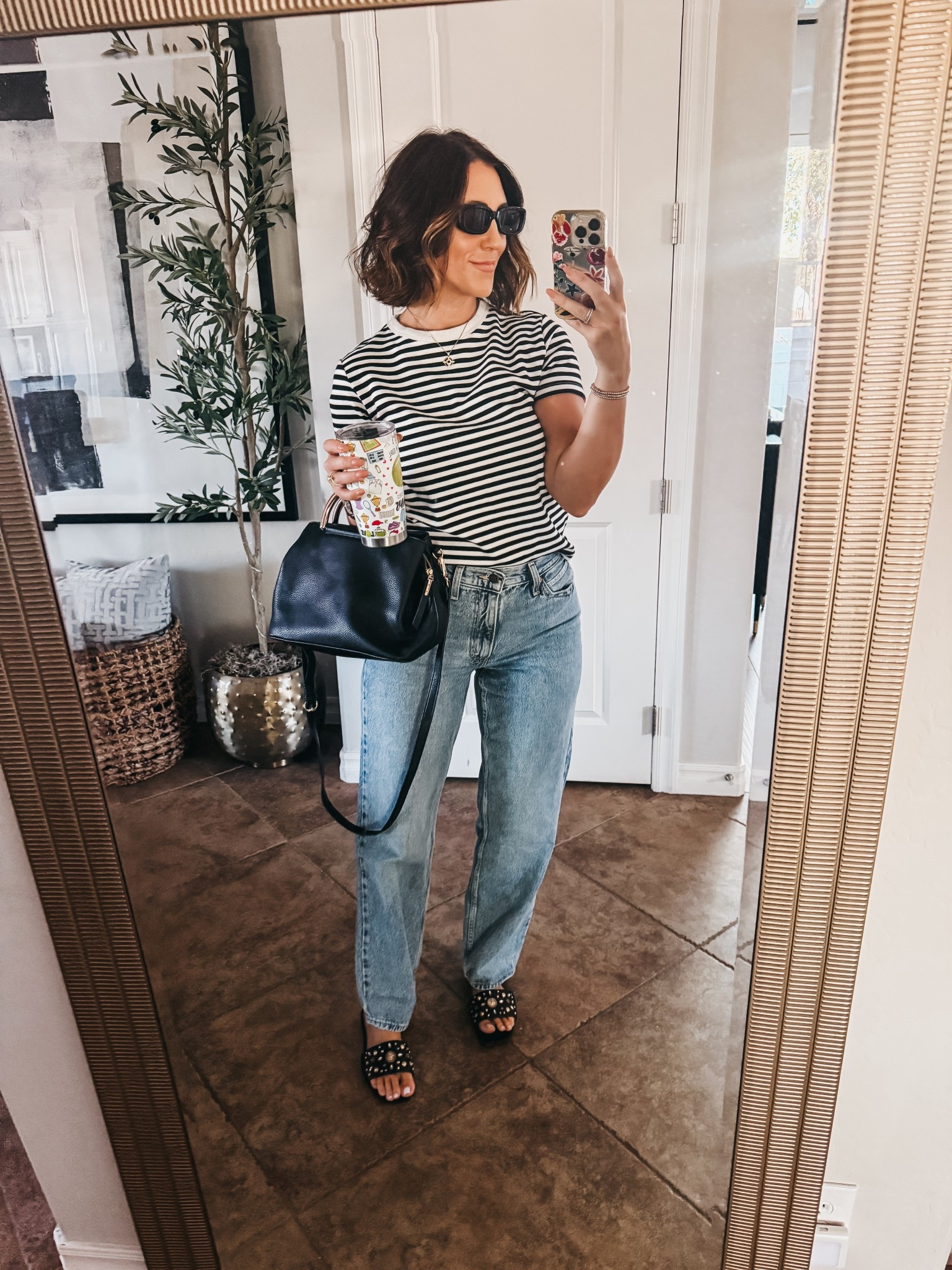 Easy early fall outfit! 🖤Striped tee and jeans! 

- T-shirt - size small 
- jeans - size 27

#LTKOver40 #LTKFindsUnder50 #LTKSaleAlert