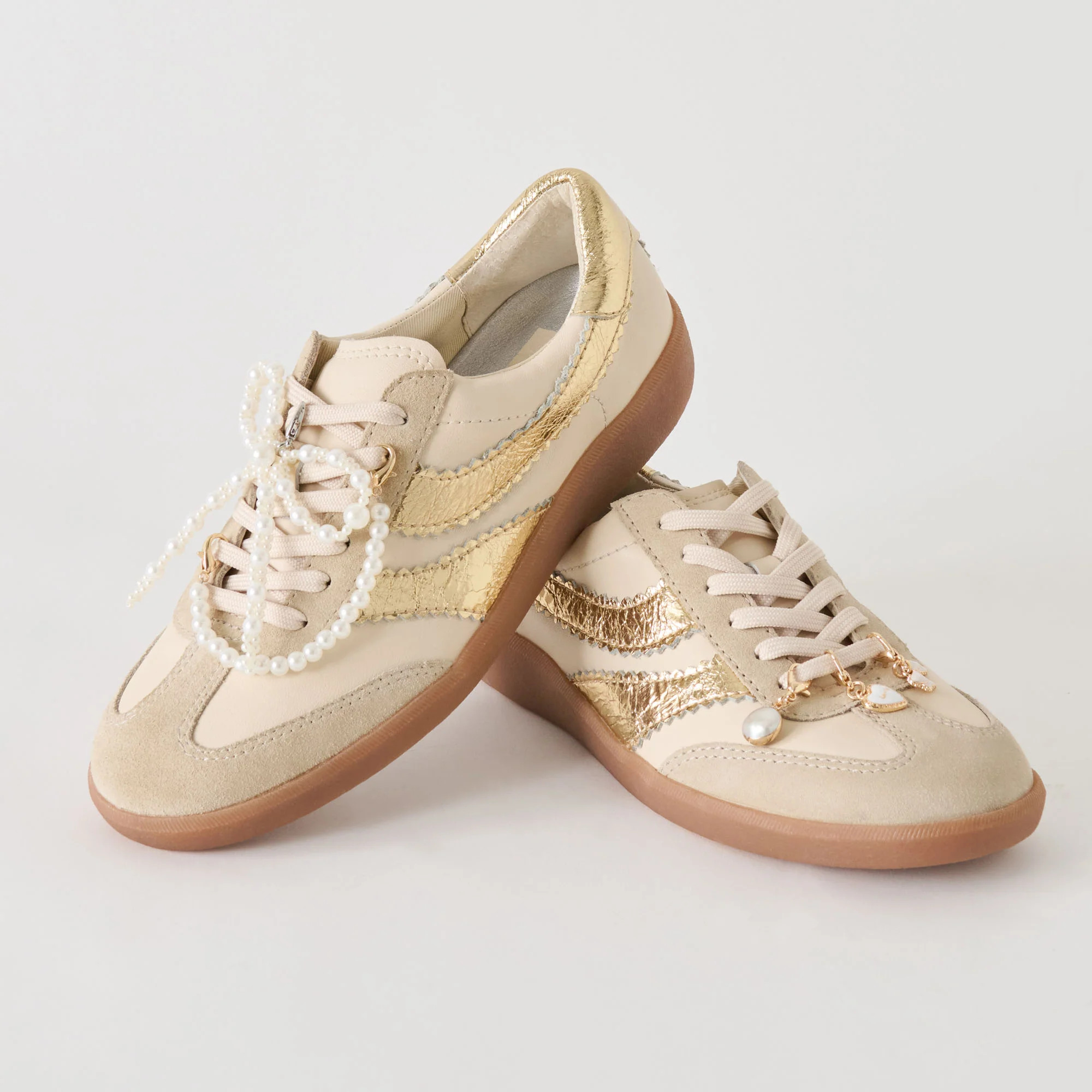 Merit White Gold Leather Sneakers + Pearl Charm Bundle | Dolce Vita | DolceVita.com