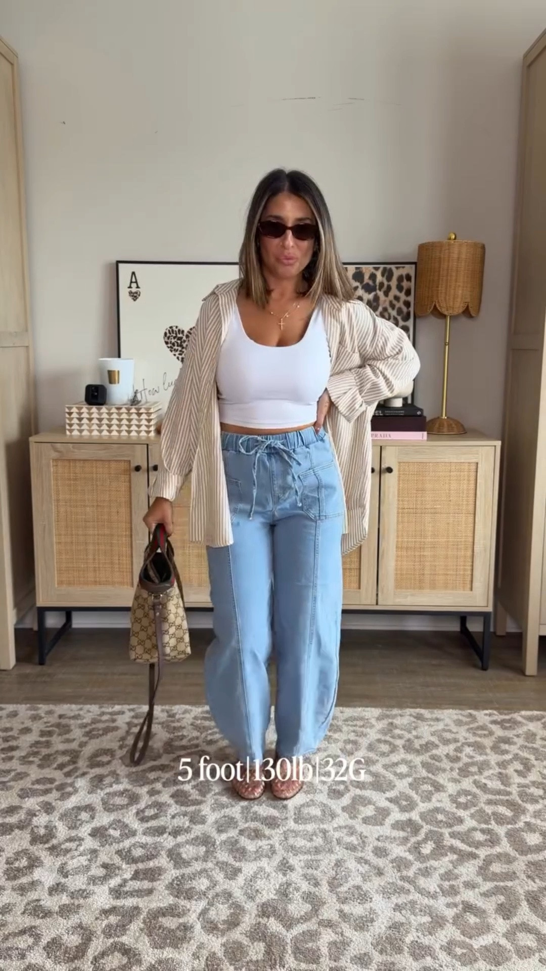 This striped top may be the most versatile, and most worn top I’ve gotten on Amazon in the last few years. It’s been an absolute staple with my go-to linen pants, my favorite shorts and now these drawstring barrel leg jeans. This look is giving cool mom, and I am here for it! 
Casual mom look, how to style drawstring jeans

#LTKMidsize #LTKPetite #LTKSeasonal