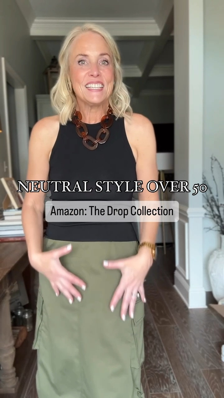 I'm thrilled to share this effortlessly chic look from The Drop Collection on Amazon! 

This lightweight sweater tank is a wardrobe staple that can be styled in countless ways, taking you seamlessly from summer into fall.  I've paired it with this fabulous green cargo midi skirt featuring a trendy elastic side scrunch – the perfect blend of comfort and style!

And let's not forget the accessories! This fun and super affordable statement necklace from Amazon adds just the right amount of flair to elevate the whole outfit. Whether you're running errands, meeting friends for lunch, or enjoying a casual evening out, this versatile ensemble has you covered. 

Remember, style knows no age. Let's embrace our fabulous 50s and beyond with confidence and flair! 

#LTKOver40 #LTKStyleTip #LTKFindsUnder50