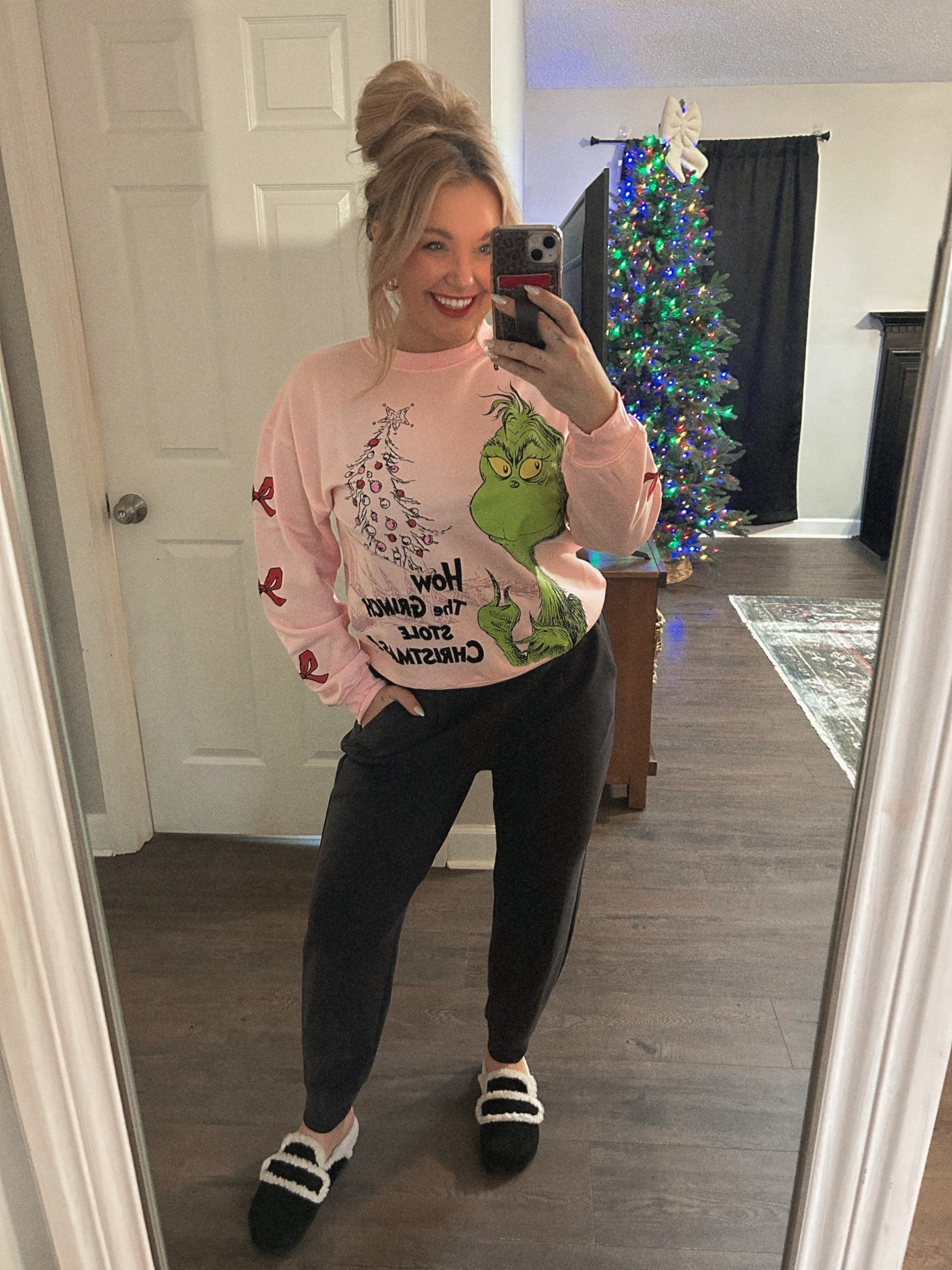 Grinch pink sweatshirt!!! Yes please! 😍 Wearing a size medium top and bottoms! 

#LTKHoliday #LTKMidsize #LTKSeasonal