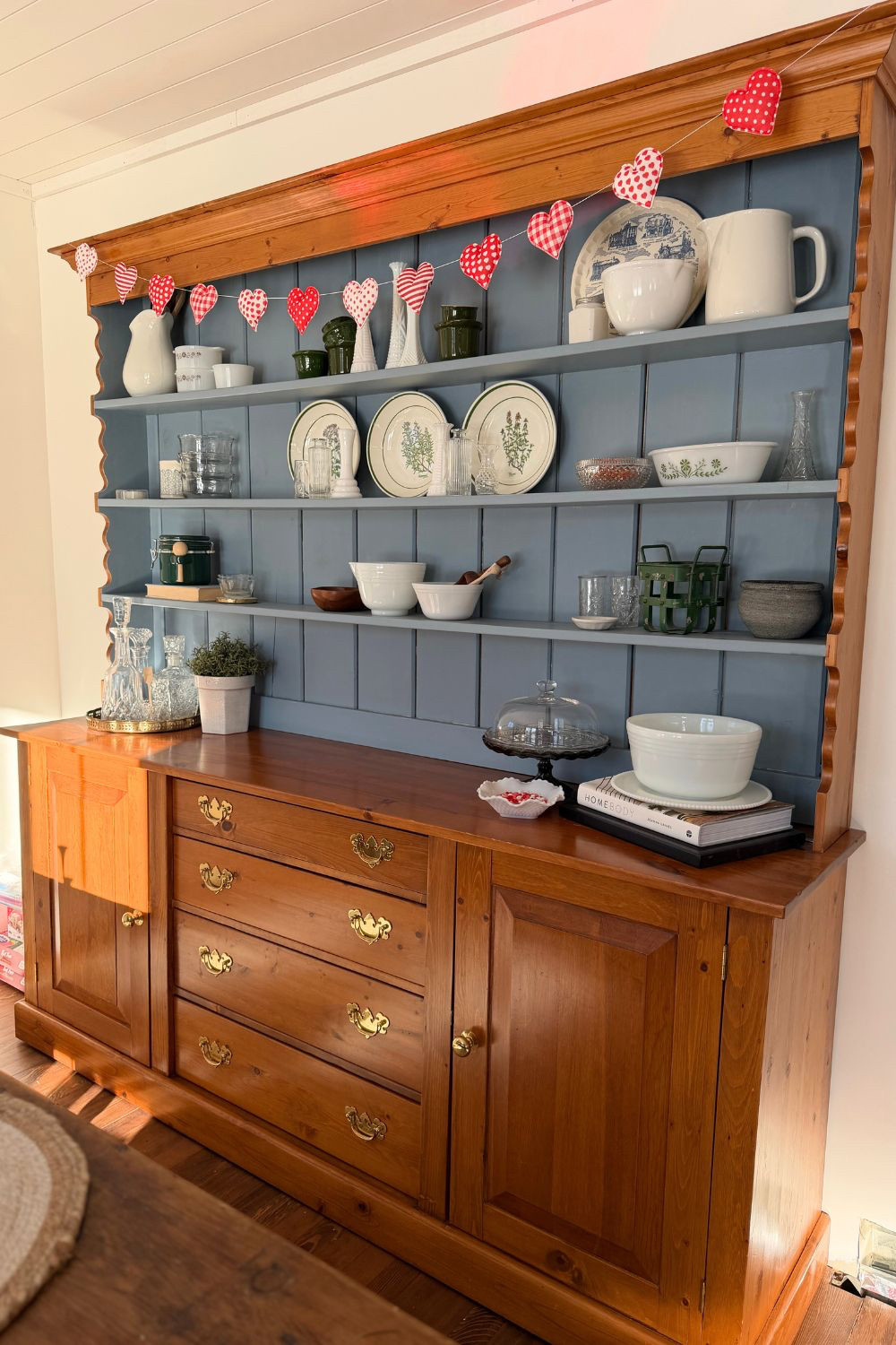 Added a few Valentines pieces to spread a little love around my home! Nothing over the top, just a few cozy touches that are easy to mix in anywhere❤️ Valentines Day decor | Valentine home decor ideas | seasonal decor swap | winter to Valentine decorating | subtle holiday decor #valentinesdaydecor  #homefinds #valentinesdecor  #seasonalhome #antiquehutch #diningroom 

 #LTKSeasonal #LTKHome #LTKFindsUnder50