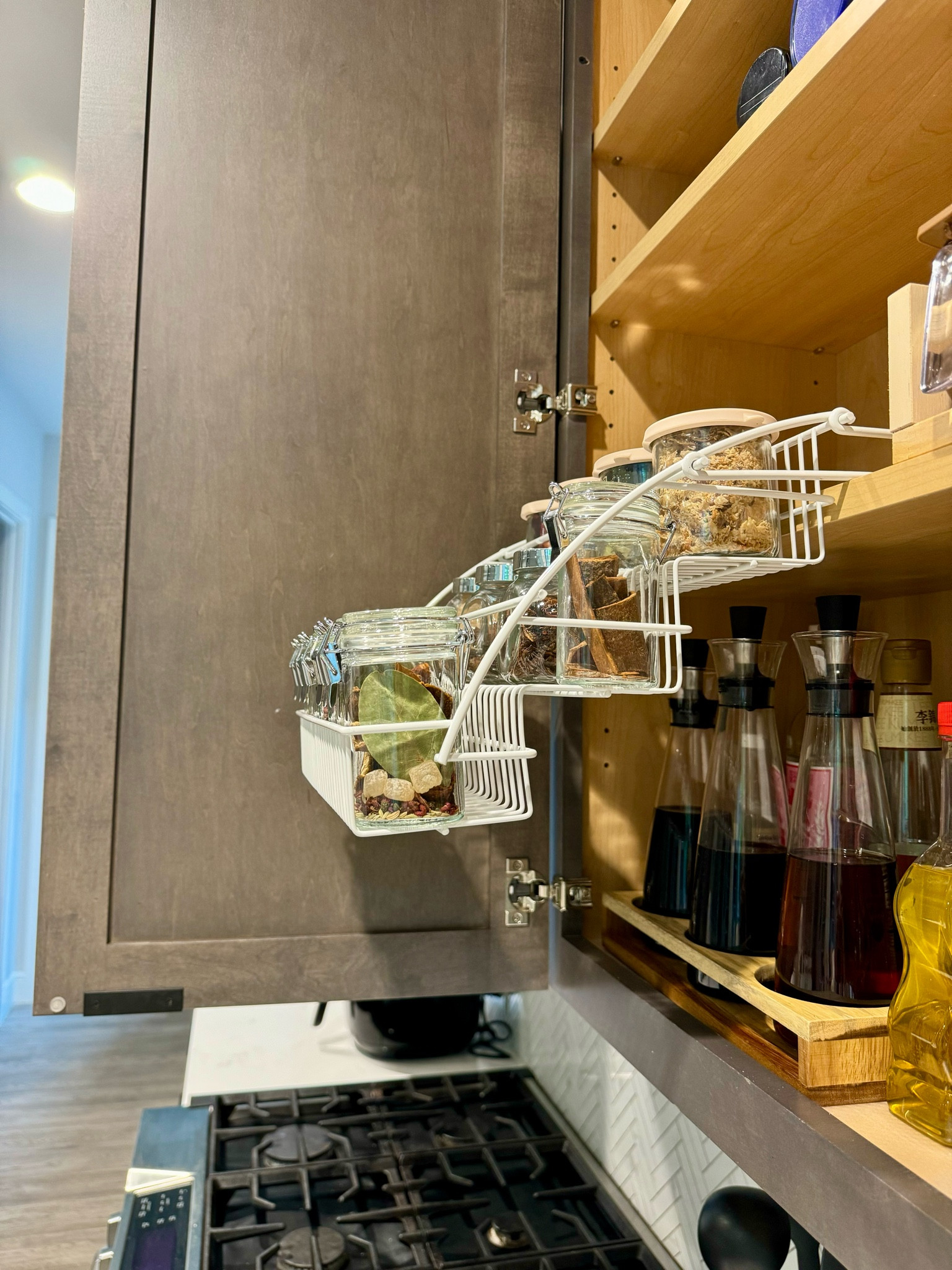 Life saver spice rack for high and deep reach Cabinet

The spice rack is out of stock right now so I linked similar items from Amazon and Temu, mine was the one from Container Store linked. The new one with plastic shelf looks more reasonable so that the bottles can be placed flat but mine doesn’t bother me 

#LTKHome