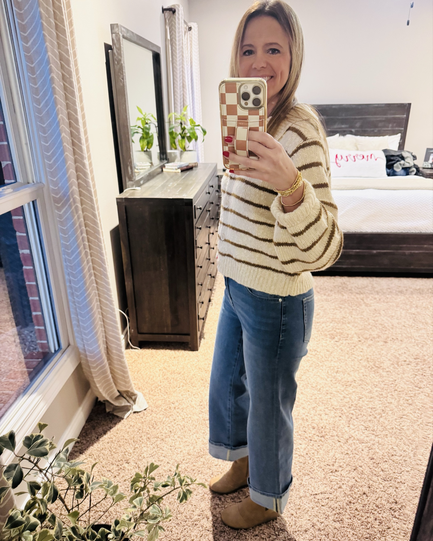 OOTD 🤎
Keeping it cozy and cute today in this striped sweater, cuffed wide-leg denim, and boots. Easy, comfy, and perfect for a chilly day! 

#OOTD #LTKStyle #LTKFashion #CasualOutfit #CozyLook #EverydayStyle

#LTKOver40 #LTKWorkwear #LTKootd