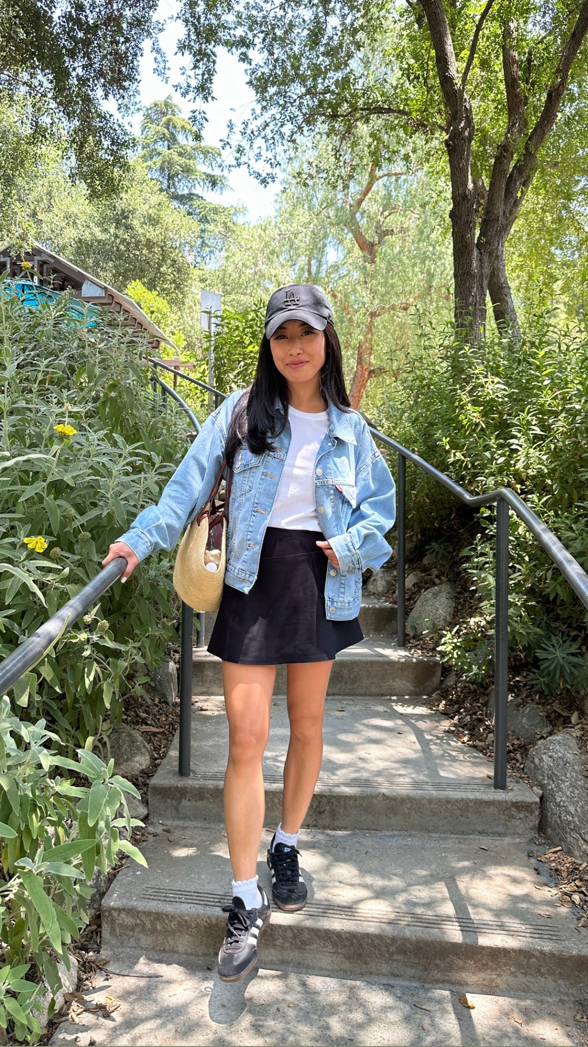 Casual mom on the go outfit. A go-to for weekends, kids sports, and theme park days like Disney too 

linked my exact and similar relaxed denim jackets in petite sizing and also a more shrunken fit! 

• AF active wear skort size xs - has built in shorts and pockets! Mine is from last year but I linked their current version.

• Levi’s 90s trucker jacket xxs - a relaxed oversized fit.

They don’t make xxs anymore so I also linked several similar options - BRF comes in petite sizing and Aritzia comes in xxs which I tried on and it fits very similar to my Levi’s one 

• Everlane white tee xs - my staple cotton tees, I size up 

• 47 brand baseball hat I have this in solid black too 

• Adidas sambas women’s 5

• Sezane Justine tote

• cat and jack target kids ruffle socks 

petite friendly spring outfits, mom athleisure outfits 

#LTKPetite #LTKActive #LTKTravel