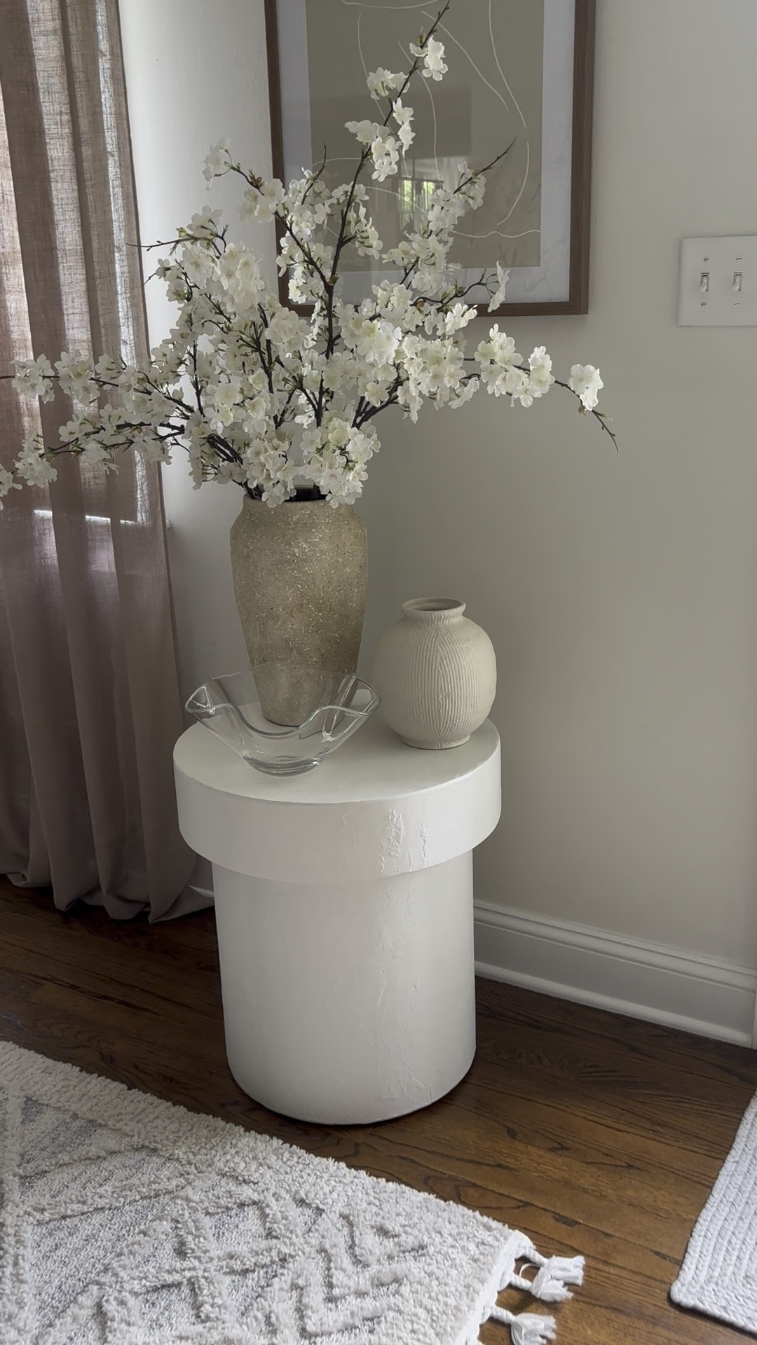 my favorite spring flowers: cherry blossoms!  🌸 

realistic artificial flowers also make a great mother’s day gift! 🙃 

👉🏻 I arranged 8 stems in my Pottery Barn artisan vase to get this full effect!  (I mixed two slighty diff types of white cherry blossoms, using 4 of each type)