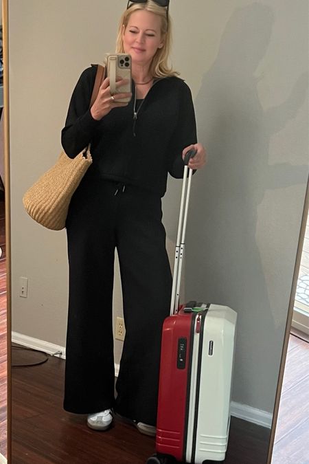 Airport outfit. I wasn’t sure I’d like these but wowza- the hype is real. The secret is the fabric- so luxe. Perfect for a cold plane! I’ve paired w/ a cami underneath to be able to shed the top layer when we reach our destination. They run large- wearing a small in top and bottom. #airessentials #airportoutfit #traveloutfit

#LTKtravel #LTKstyletip #LTKover40