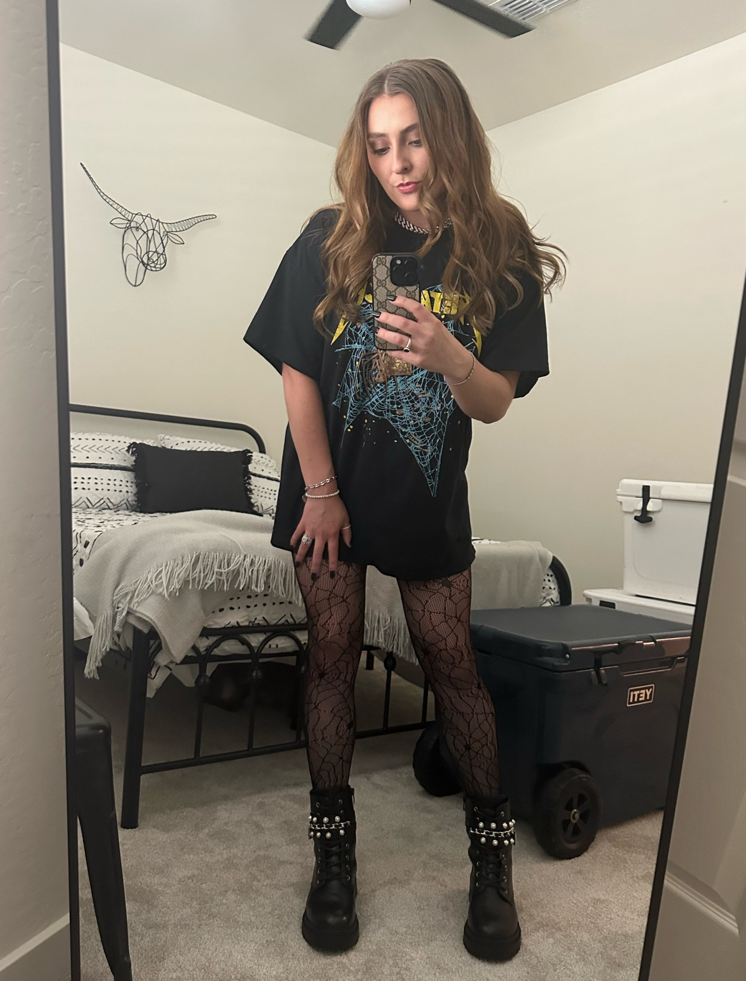Metallica concert outfit! Finally figured out my sizing for the perfect oversized tee 🤣 I went up 3 sizes! Original shirt from Spencer’s but tagging similar 
Top: XL
Boots: 8

#LTKHalloween #LTKfindsunder50 #LTKfindsunder100