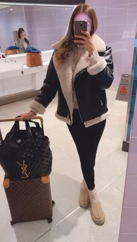 Airport outfit I wore to New York. LOVE this jacket, it’s so warm and cozy, I am wearing a very comfy and beautiful sweater, black joggers and my cozy socks and slippers from Amazon. This tote is amazing, fits so many things, splurge worthy. 

#LTKstyletip #LTKSeasonal #LTKtravel