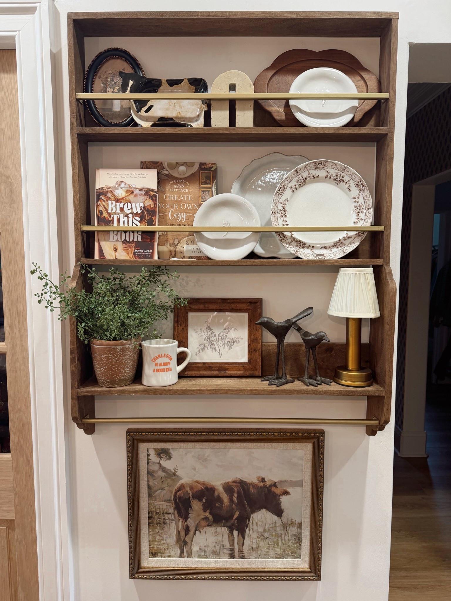 Plate rack restyle for the new year 🤌🏼 love the vibes!!!! Linked what I could but some of it is old, antique or Hobby Lobby🤎

Home decor / styling / kitchen / cozy space / Holley Gabrielle 

#LTKHome #LTKFindsUnder100 #LTKFindsUnder50