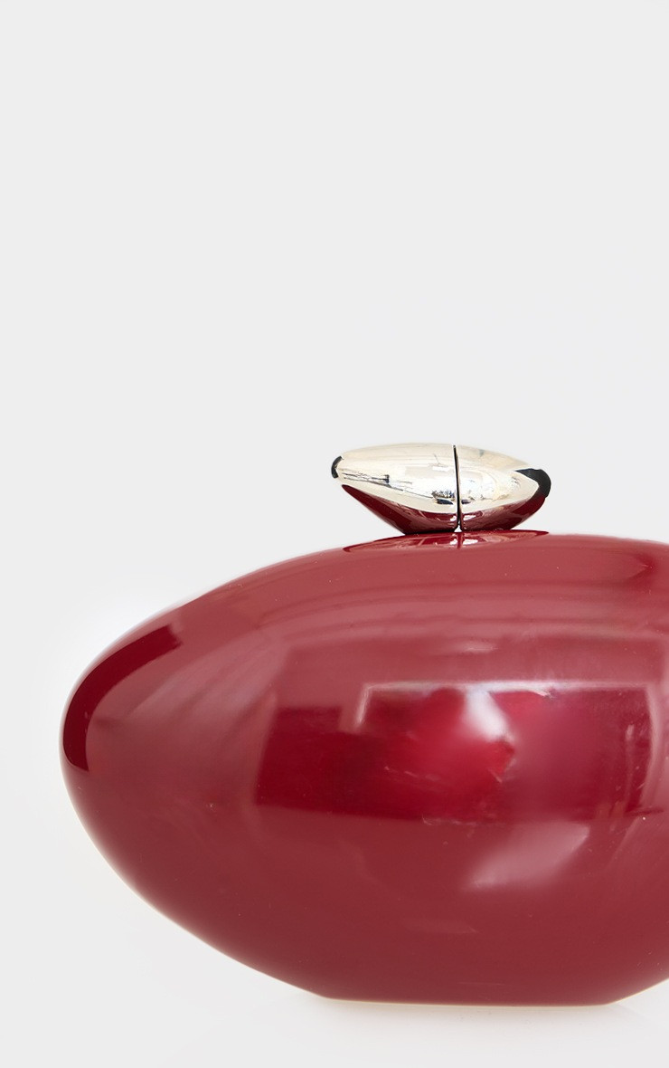 Burgundy Gloss Oval Hard Clutch | PrettyLittleThing UK