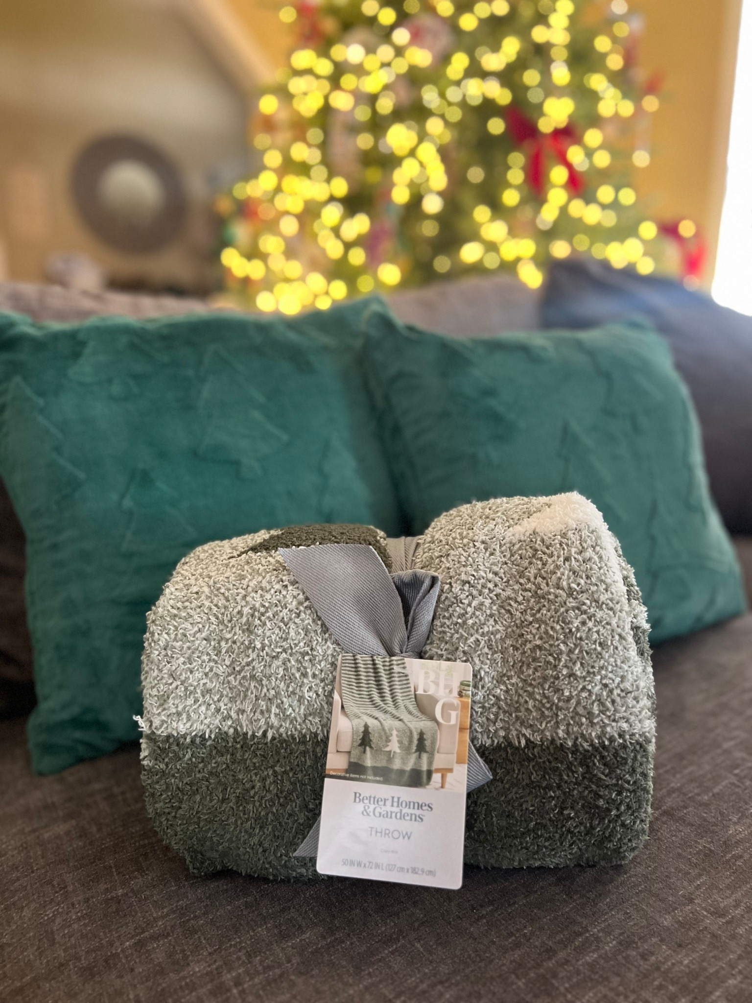 Non expensive Holiday living room touch ups. Better Homes & Gardens Christmas Tree Cozy Knit Oversized Couch Throw Blanket | Mainstays 18" x 18" Green Faux Fur Trees Decorative Pillows set of 2. 

#LTKHoliday #LTKGiftGuide #LTKHome