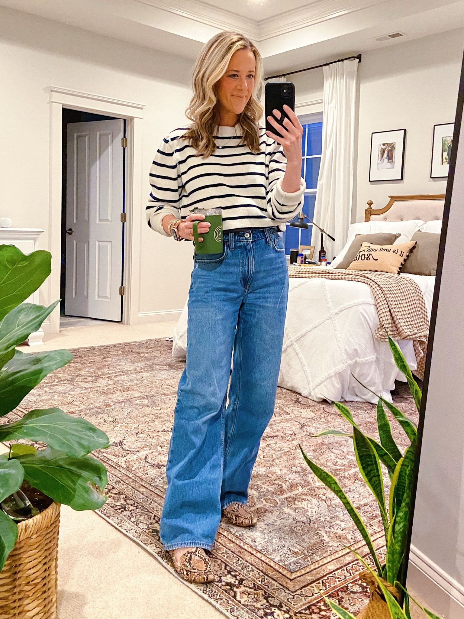 Cold spring day outfit. The weather is yo-yoing here. One day it’s 80 the next is 50s  

Stripe Sweater: It’s old but linking a few Amazon options
Wide Leg Jeans: Abercrombie High Rise Loose Fit (25r)
Also featuring a SPILL PROOF coffee cup! A mommy must have. 

Elevated Mom Style | WFH Spring Outfit | Stripe Sweater | Spring Wide Leg Jeans | Casual Workwear | Mom Outfit

#LTKfindsunder100 #LTKstyletip #LTKfindsunder50