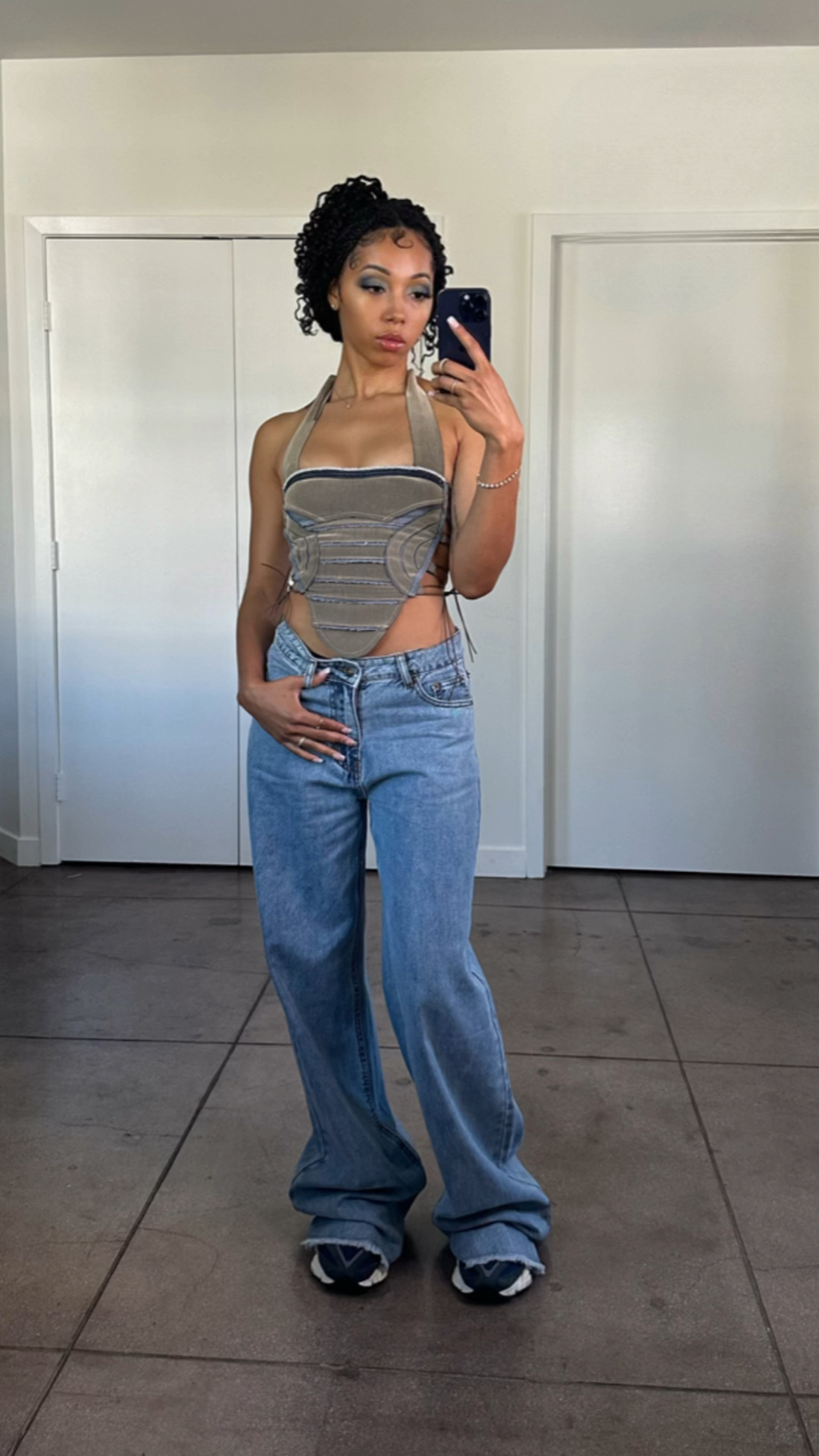 was feeling a bit y2k today 😘✌🏽

corset @a.r8d 
jeans @shopbop 
sneakers @newbalance 
bag @poppylissiman 

#LTKVideo