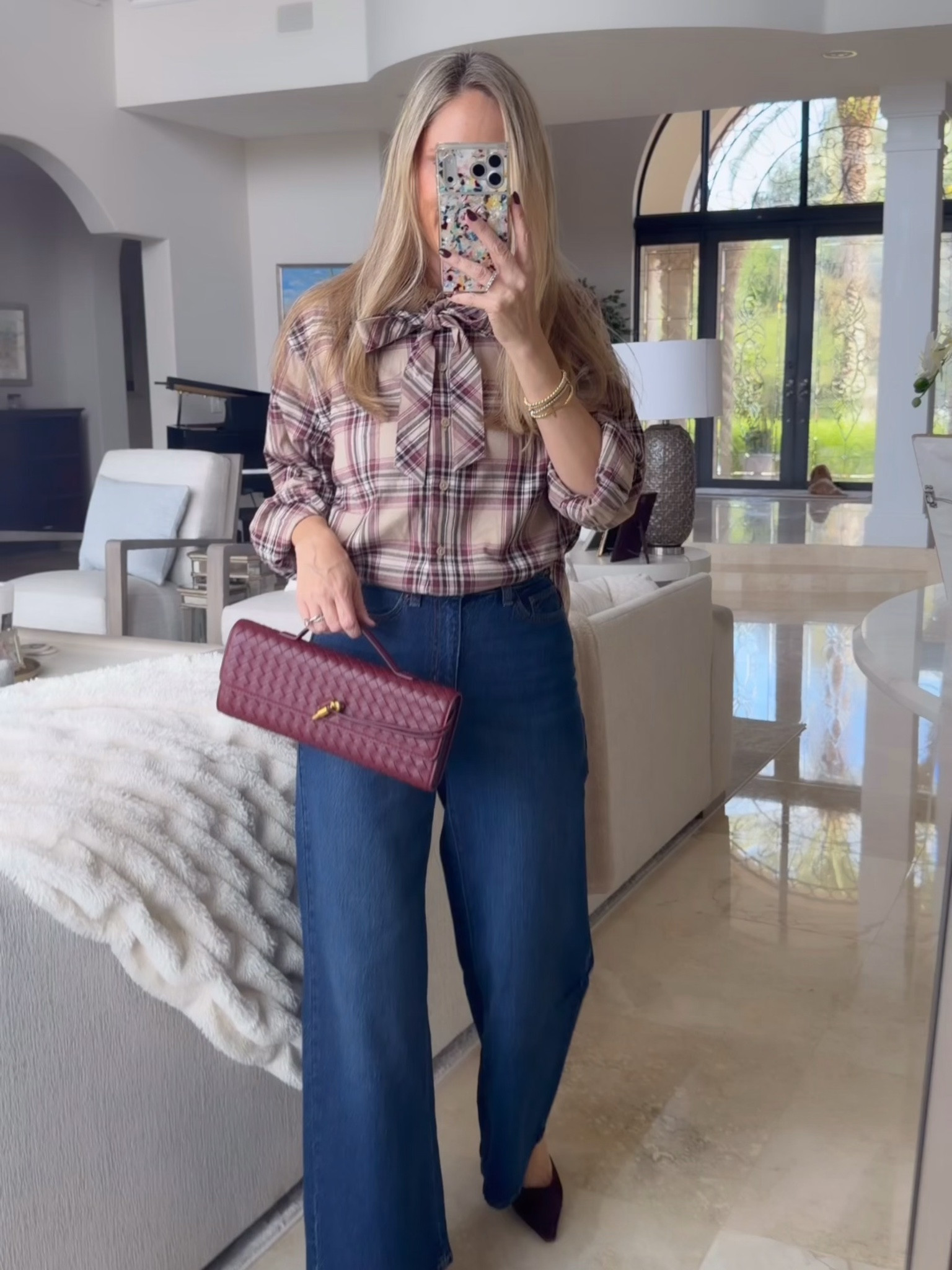 A buttoned top and long pants hold a steady rhythm for a quiet day. The fit needs to stay simple when the look shifts.

#LTKootd #LTKgrwm #LTKOver40