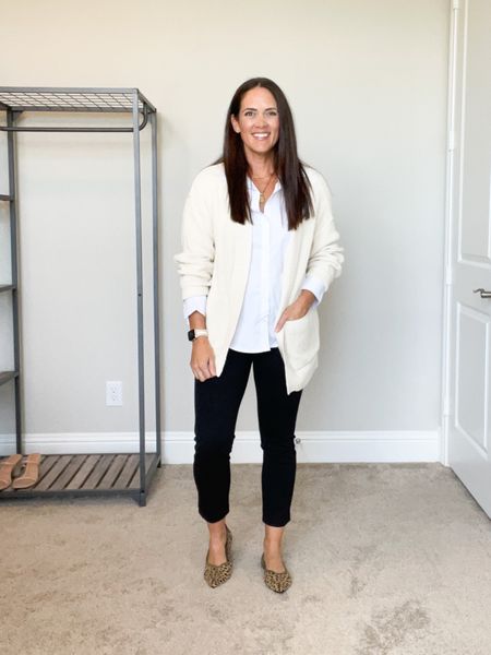 I love the unexpected color combination of the white button up and cream cardigan. Casual layers for the office / work place / teacher outfit 
White shirt - tts small
Cardigan  small tts
Black pants - tts 
Linked similar amazon flats 

#LTKworkwear #LTKstyletip #LTKSeasonal