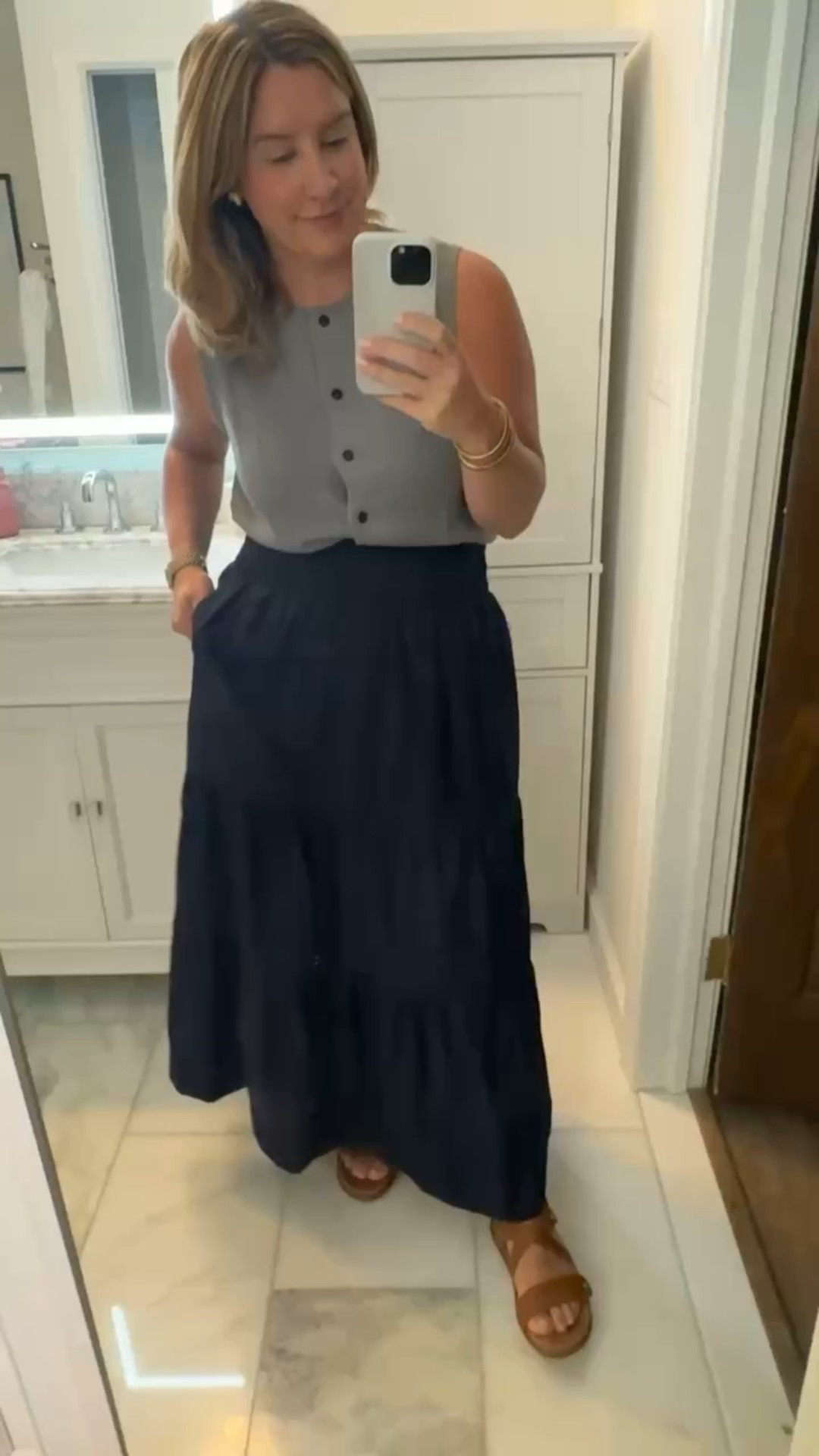 Love this sweater vest top from Amazon and tiered skirt! Perfect for looking more dressy on vacation. Great for walking around. Classic fashion, midsize fashionn

#LTKMidsize #LTKFindsUnder50 #LTKStyleTip