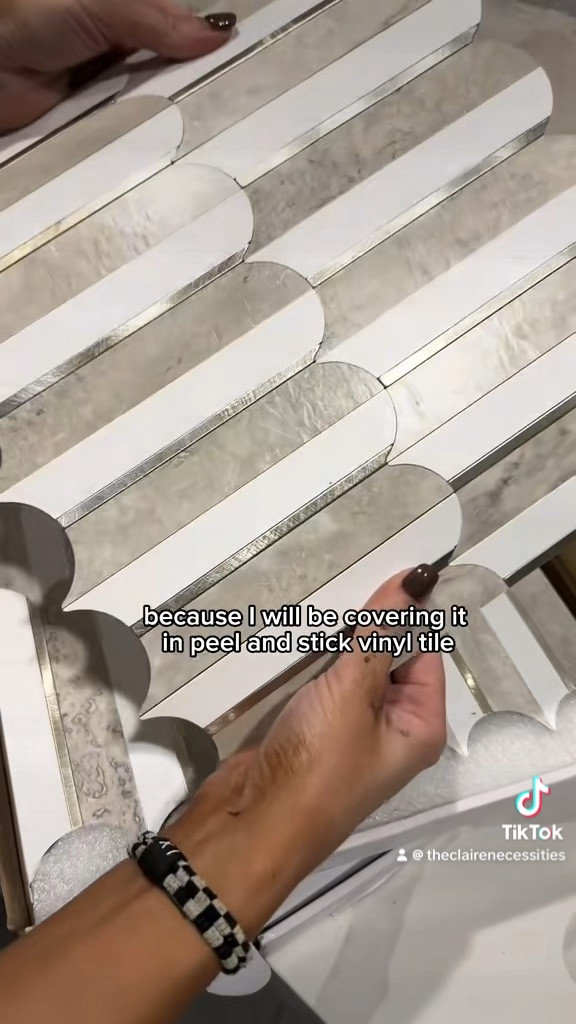 These peel and stick tiles are soooo good. We used 10 packs here! #LTKdiy

#LTKHome