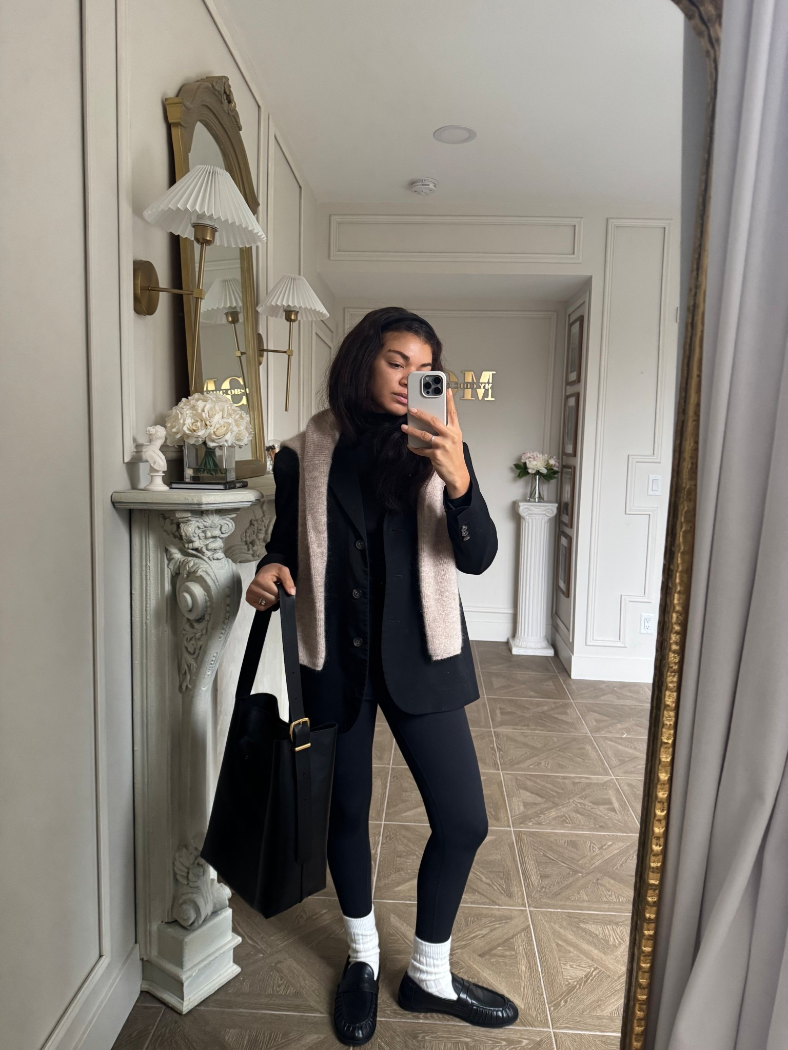 Elevate your leggings outfit with this casual chic outfit idea. Pair your leggings with a blazer, turtleneck, penny loafers, and a draped sweater 

#LTKootd