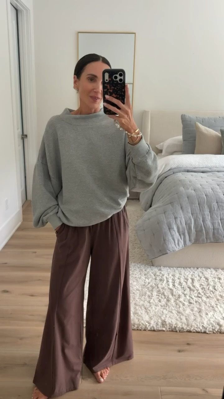 This cozy fall outfit is all about comfort without losing style. The oversized gray sweater paired with flowy chocolate brown pants creates the prettiest neutral color combination for the season.

gray sweater, chocolate brown pants, fall outfit, neutral fall style, cozy outfit, wide leg pants, oversized sweater, casual fall fashion, transitional outfit, everyday style, annabrstyle

#LTKootd #LTKSeasonal #LTKOver40