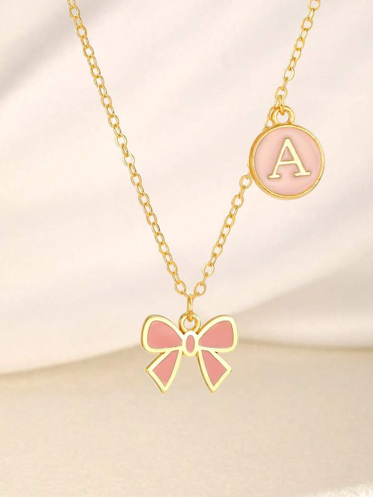 1pc Cute & Elegant Dopamine Style Pink Bow & 26 English Letter Zinc Alloy Double Pendant Necklace, Clavicle Chain, Gold Color, Suitable For Children, Friends, Summer, Travel, Street Fashion Accessory, Suitable For Daily Decoration, Holiday & Birthday Gift | SHEIN
