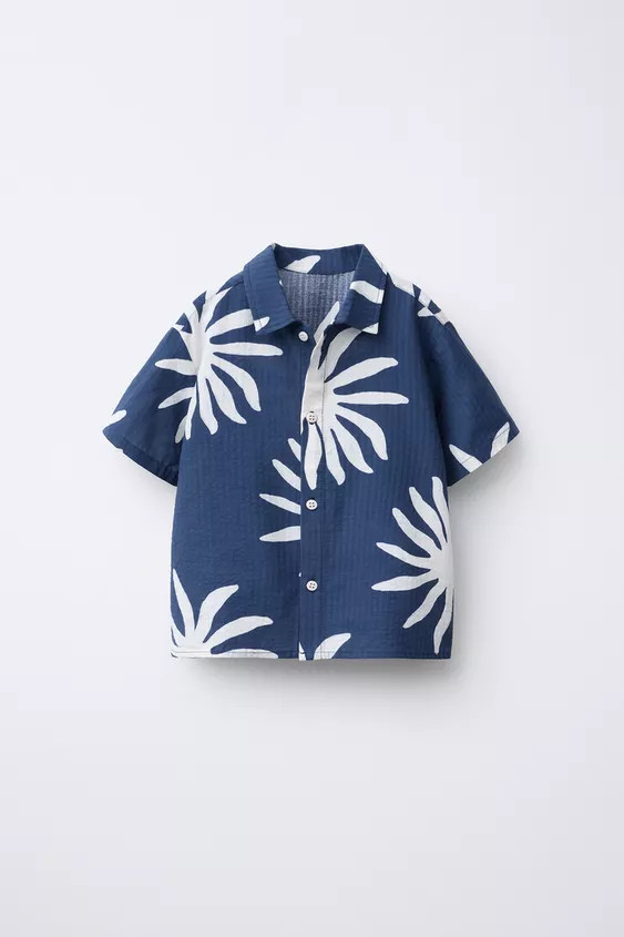 Short sleeve shirt with collared neckline. Sun print. | Zara US