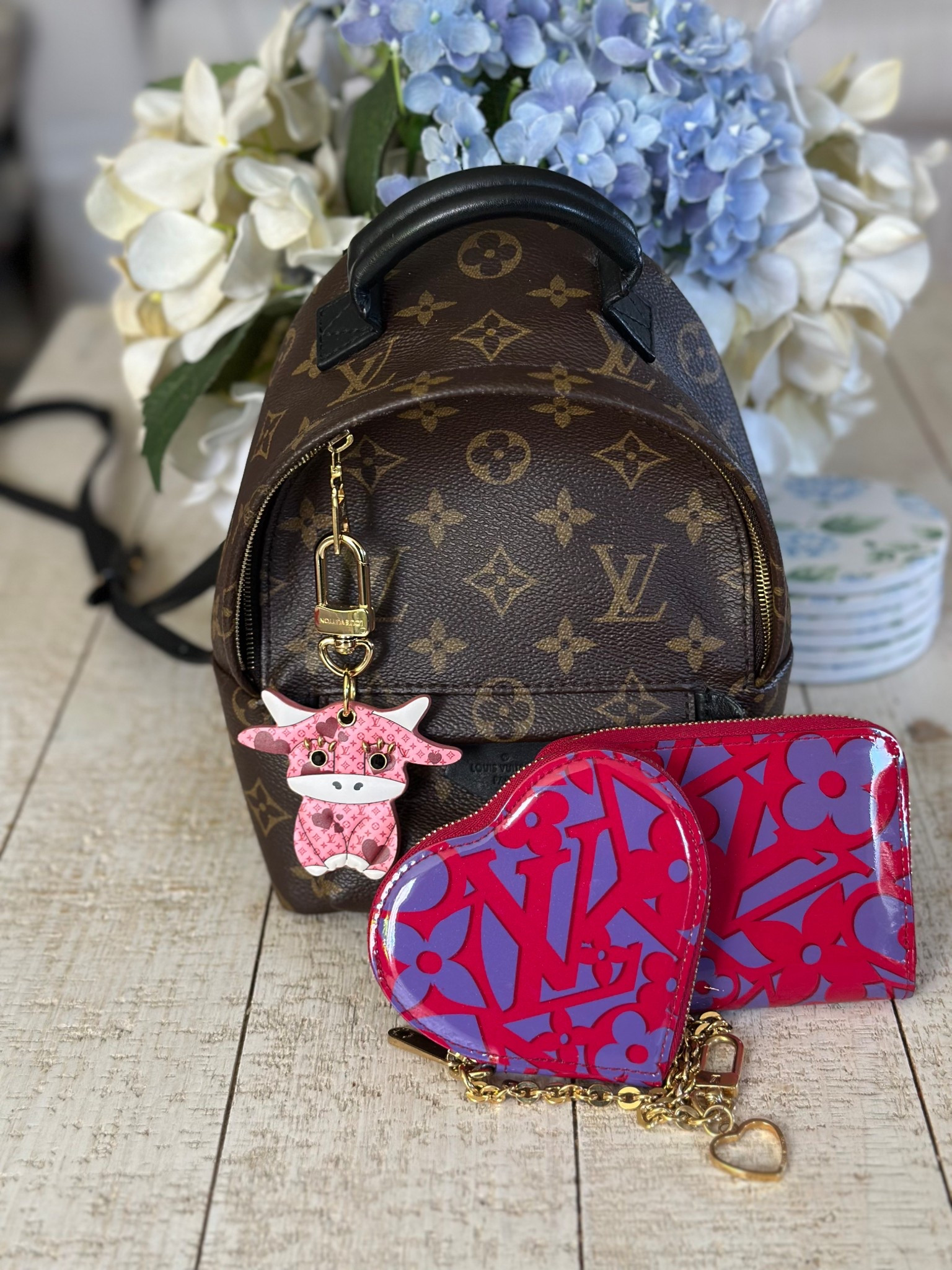 Happy Monogram Monday! Using my LV Palm Springs Mini backpack, Ox charm and zippy coin and heart coin purses from a few years ago. 

#LTKSeasonal #LTKItBag #LTKGiftGuide
