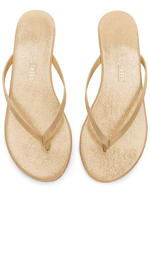 TKEES Glitters Flip Flop in Metallic Gold. - size 9 | Revolve Clothing (Global)