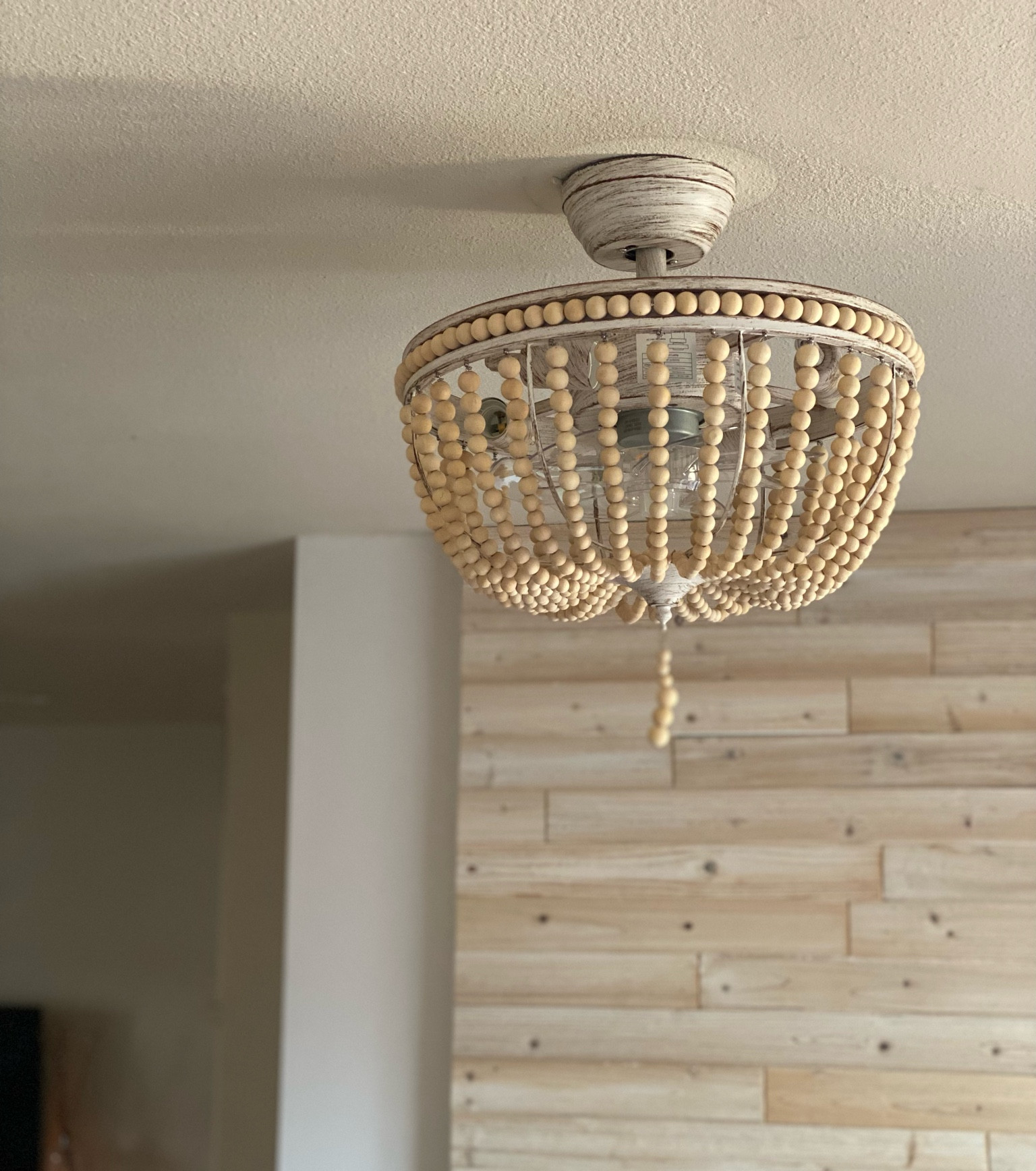 Wood beaded chandelier with invisible fan 

#LTKhome