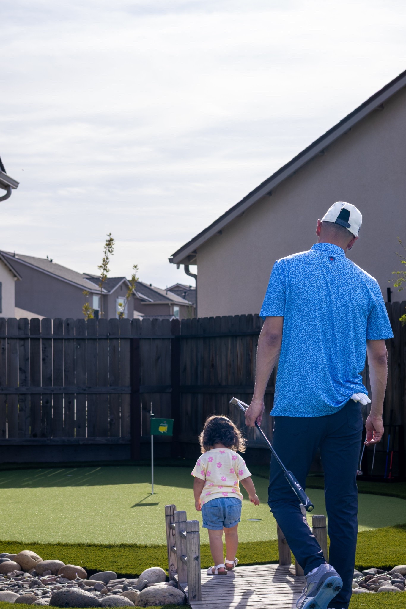 Backyard putting practice with my 💜 #golf #golfpolo #girldad #flagandanthem 

#LTKMens #LTKActive